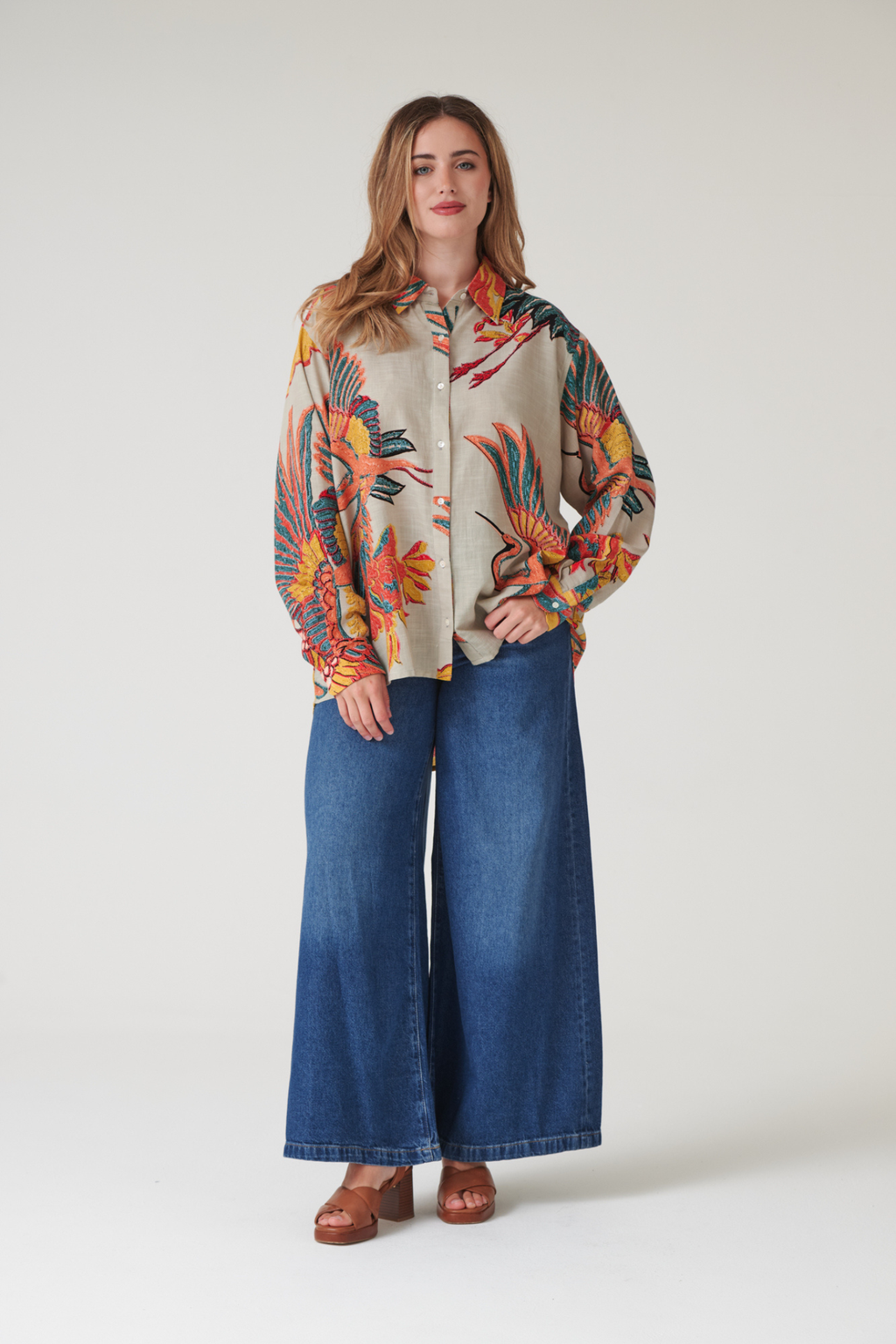 Oversized Crane Stone shirt by One Hundred Stars in a premium modal-cupro blend. Easy, relaxed style with fluid drape — perfect for layering or as a stand-alone piece. Shop at Dotique.