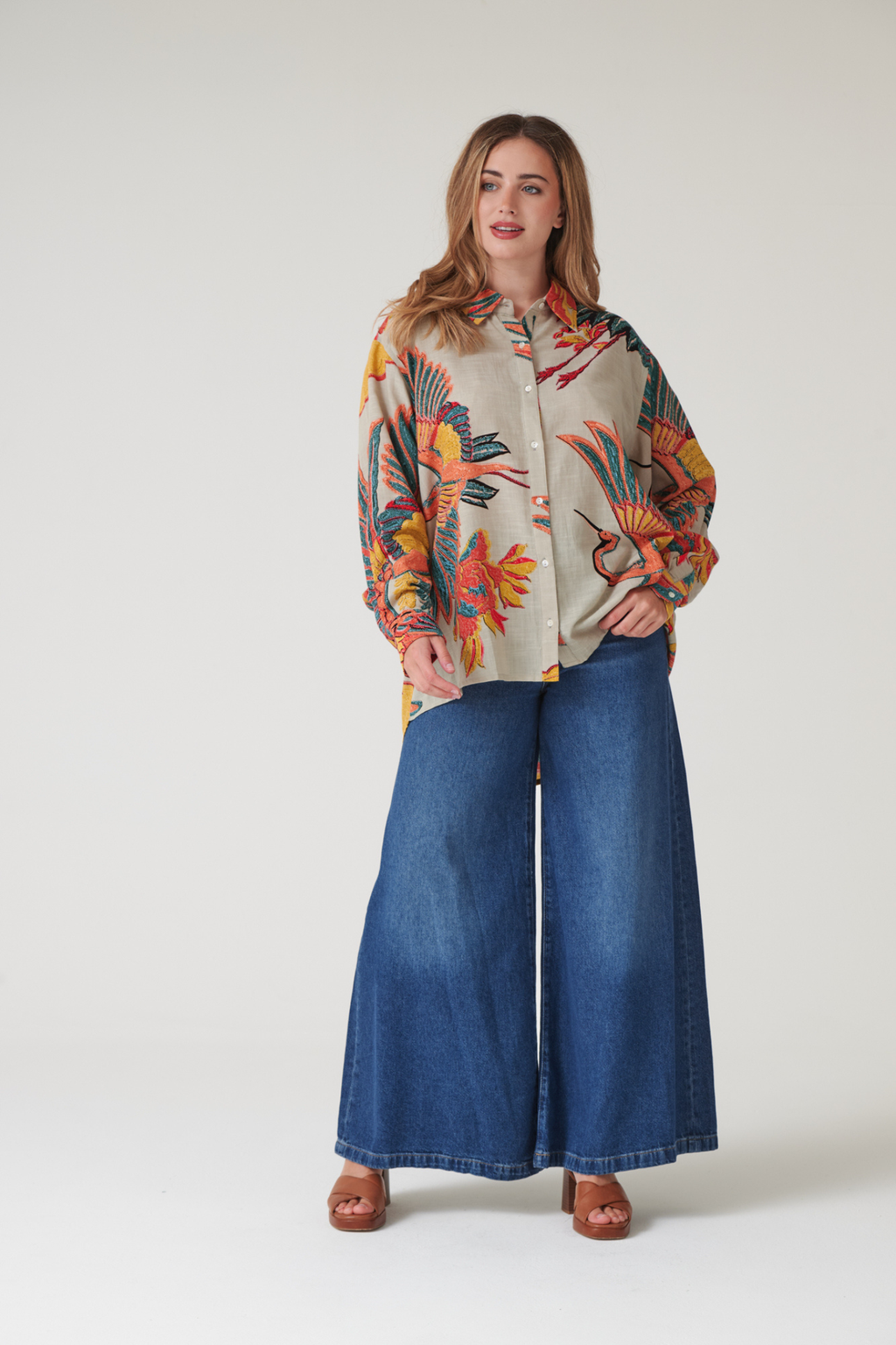 Oversized Crane Stone shirt by One Hundred Stars in a premium modal-cupro blend. Easy, relaxed style with fluid drape — perfect for layering or as a stand-alone piece. Shop at Dotique.