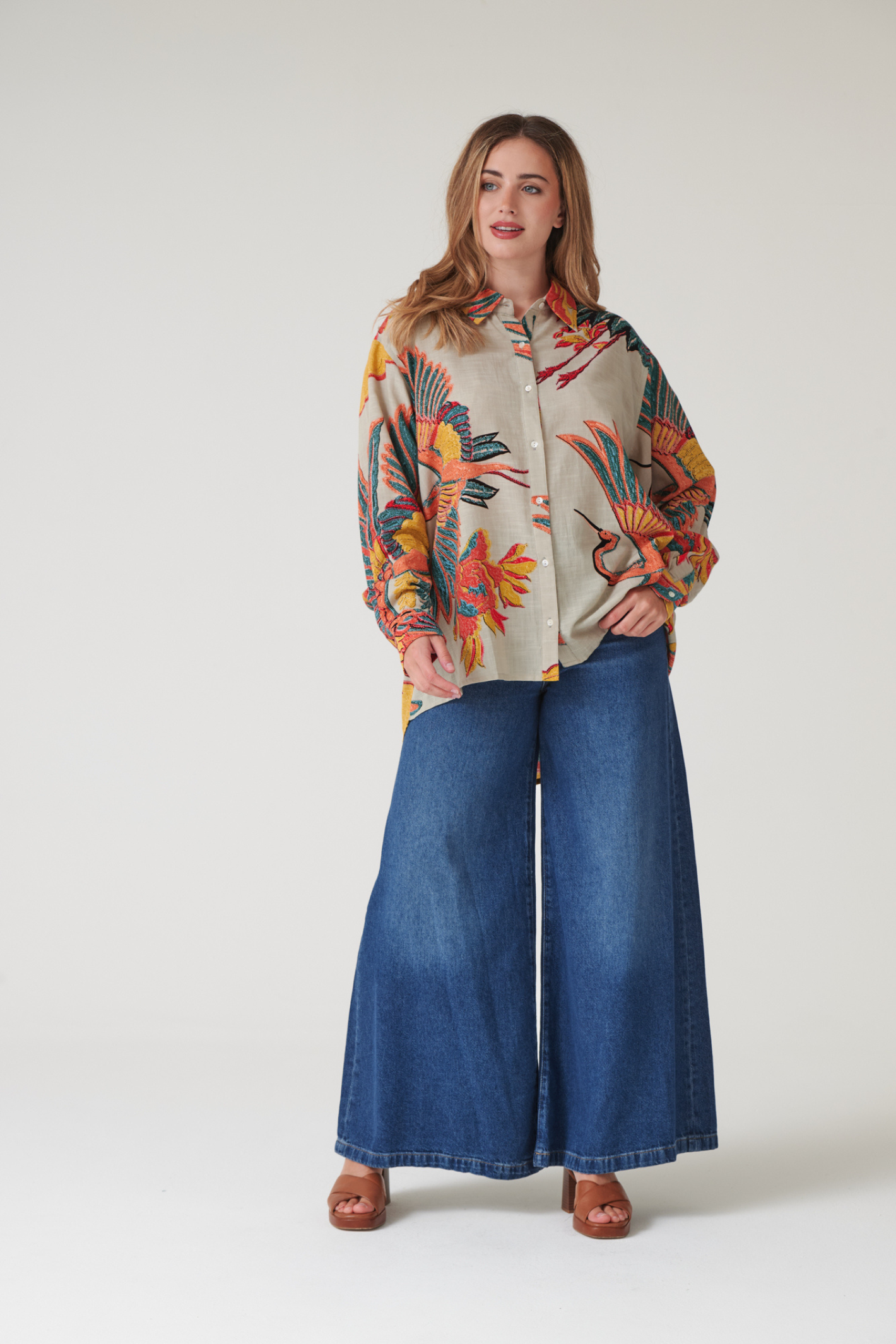 Oversized Crane Stone shirt by One Hundred Stars in a premium modal-cupro blend. Easy, relaxed style with fluid drape — perfect for layering or as a stand-alone piece. Shop at Dotique.
