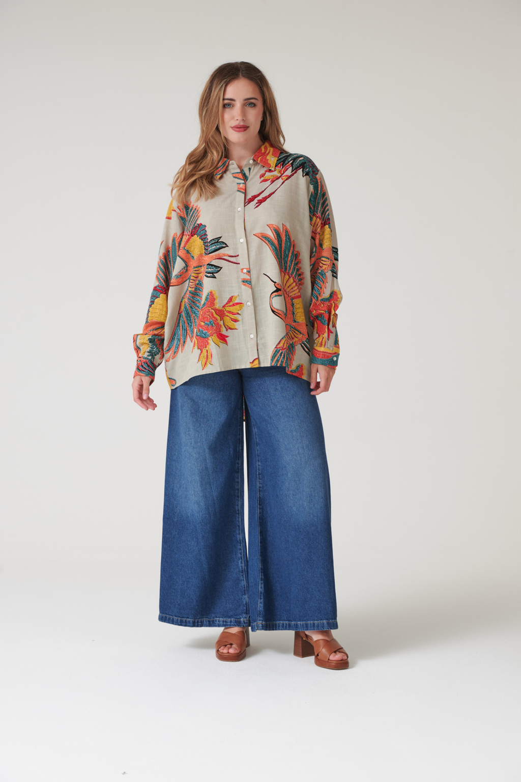 Oversized Crane Stone shirt by One Hundred Stars in a premium modal-cupro blend. Easy, relaxed style with fluid drape — perfect for layering or as a stand-alone piece. Shop at Dotique.