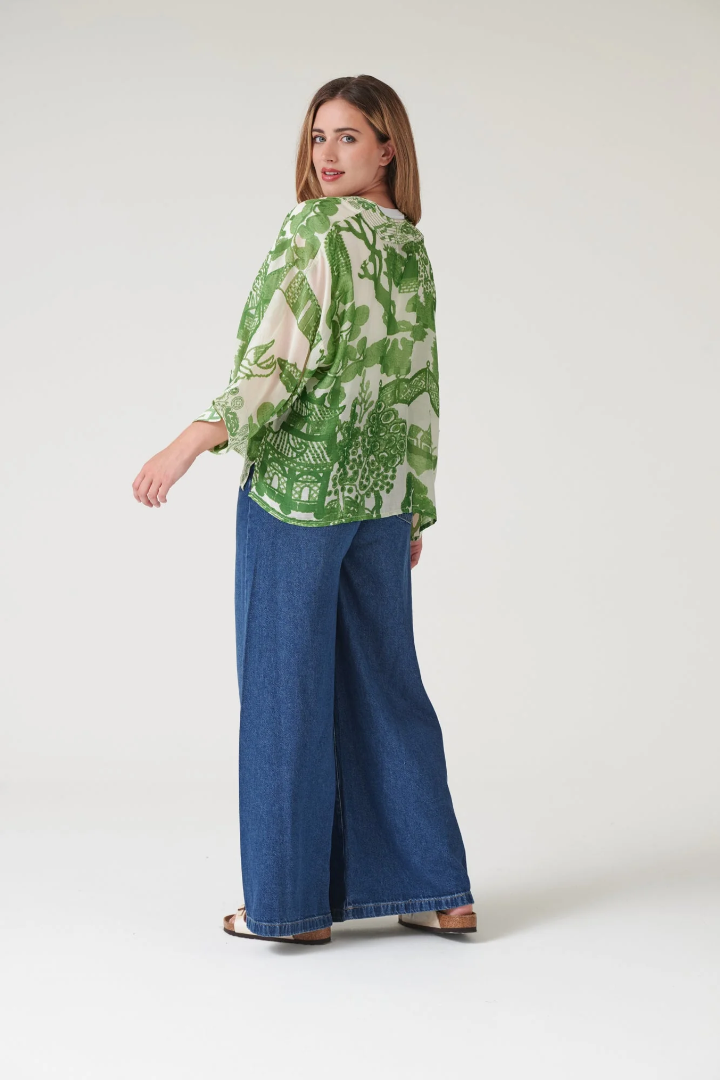 Giant Willow Green kimono by One Hundred Stars in a premium modal-cupro blend. Lightweight, fluid and perfect for layering over dresses, tops or swimwear. Shop at Dotique.