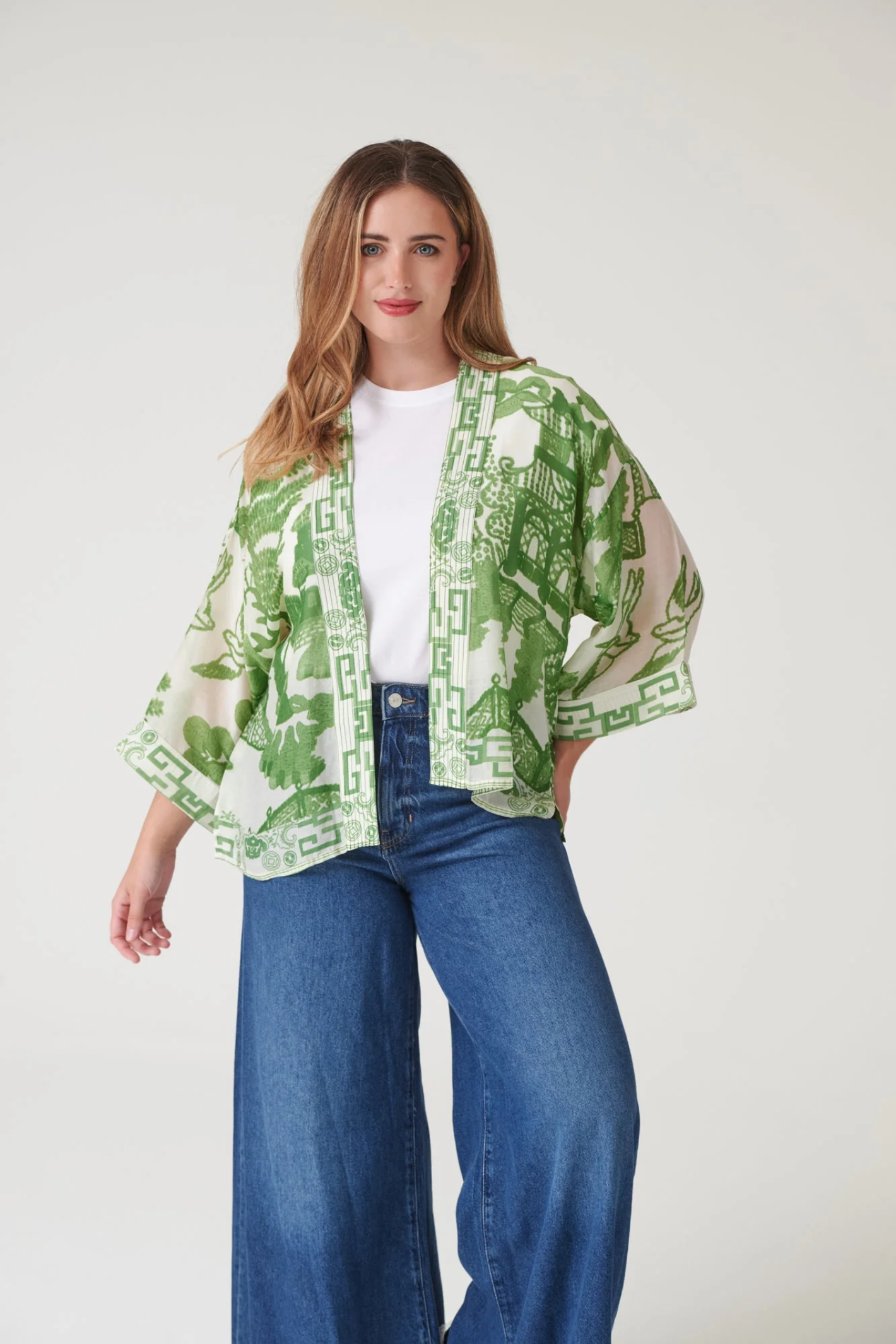 Giant Willow Green kimono by One Hundred Stars in a premium modal-cupro blend. Lightweight, fluid and perfect for layering over dresses, tops or swimwear. Shop at Dotique.
