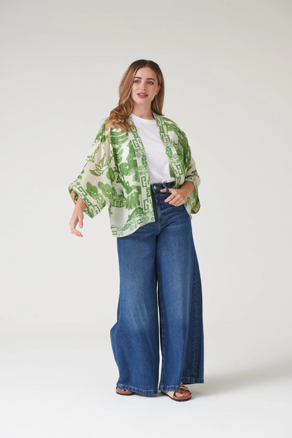 Giant Willow Green kimono by One Hundred Stars in a premium modal-cupro blend. Lightweight, fluid and perfect for layering over dresses, tops or swimwear. Shop at Dotique.