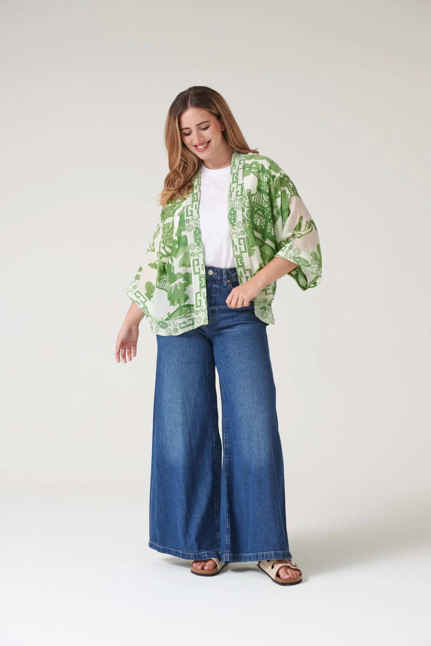 Giant Willow Green kimono by One Hundred Stars in a premium modal-cupro blend. Lightweight, fluid and perfect for layering over dresses, tops or swimwear. Shop at Dotique.