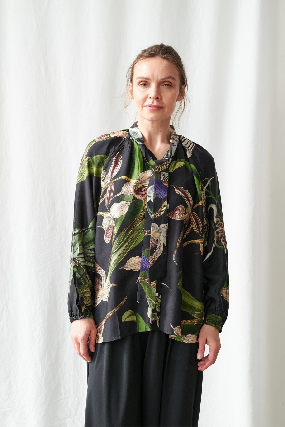 Orchid Black PussyBow Blouse by One Hundred Stars, view 1. Shop One Hundred Stars at Dotique.