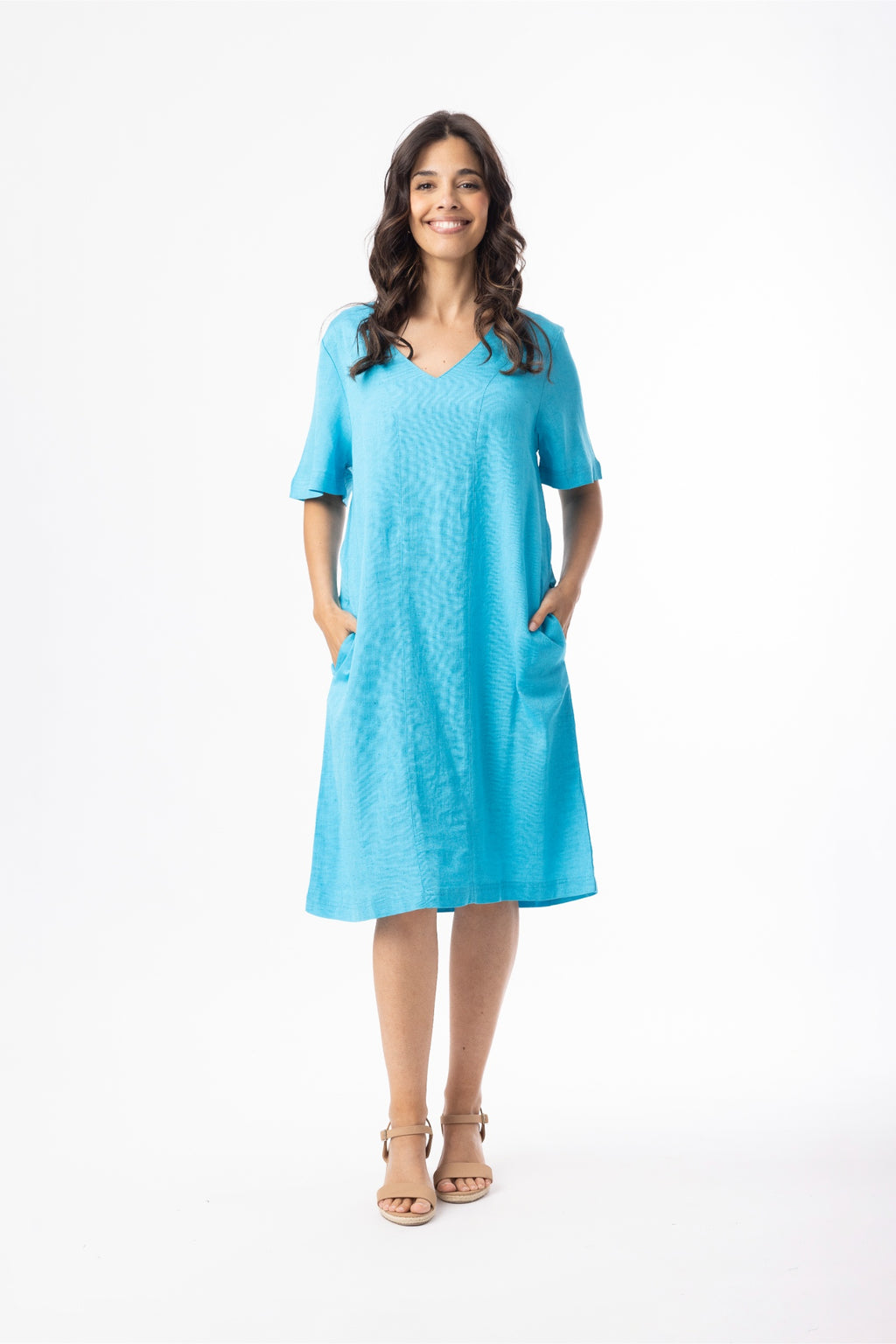 Smiling model front wearing Orientique 61766 Linen Essentials Shift Dress Aqua by orientique, shop orientique at Dotique