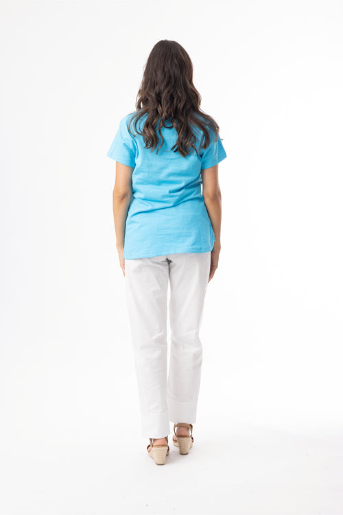 Model wearing Orientique 92129 Knit Essentials V-neck Tee Turquoise by orientique, shop orientique at Dotique in casual look from back view