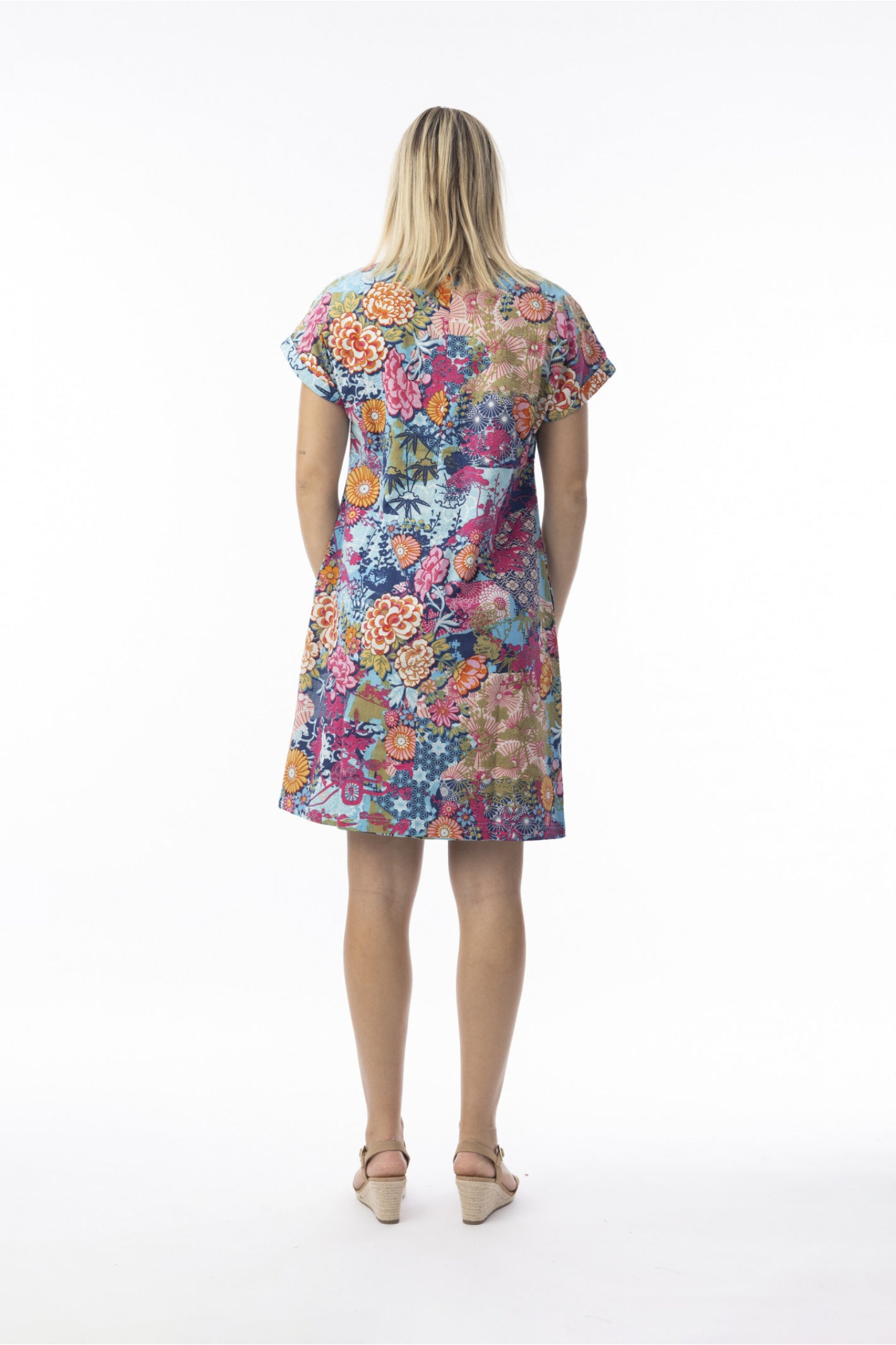 Rear view of model wearing Orientique 20136 Ikebana Dress Reversible Short Sleeve Print by orientique, shop orientique at Dotique