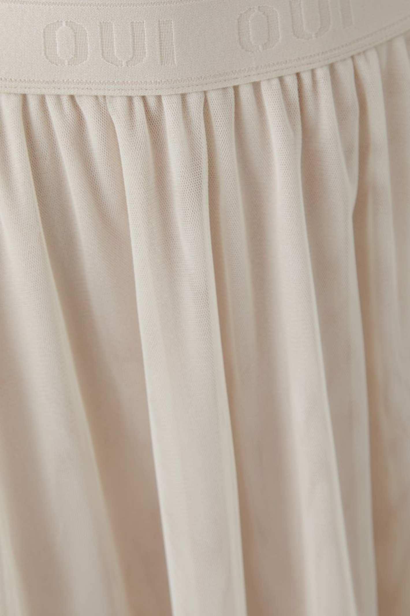 Close-up of Oui 96669 A-Line Midi Skirt – Rose White by Oui with gathered fabric detail, shop Oui at Dotique.