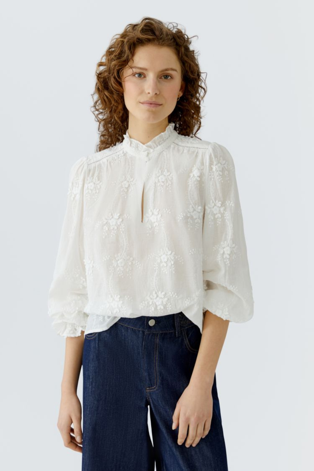 Cotton embroidered blouse by Oui in Cloud Dancer. A soft, feminine style with delicate detail, perfect for everyday and dressed-up looks. Shop at Dotique.