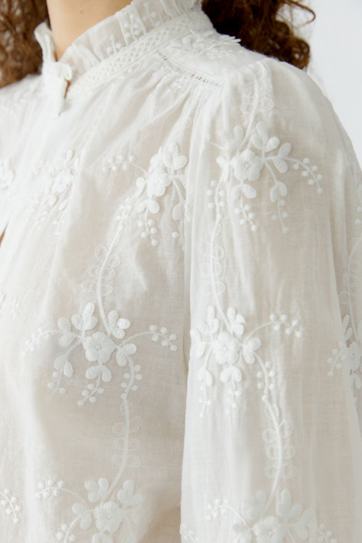 Cotton embroidered blouse by Oui in Cloud Dancer. A soft, feminine style with delicate detail, perfect for everyday and dressed-up looks. Shop at Dotique.