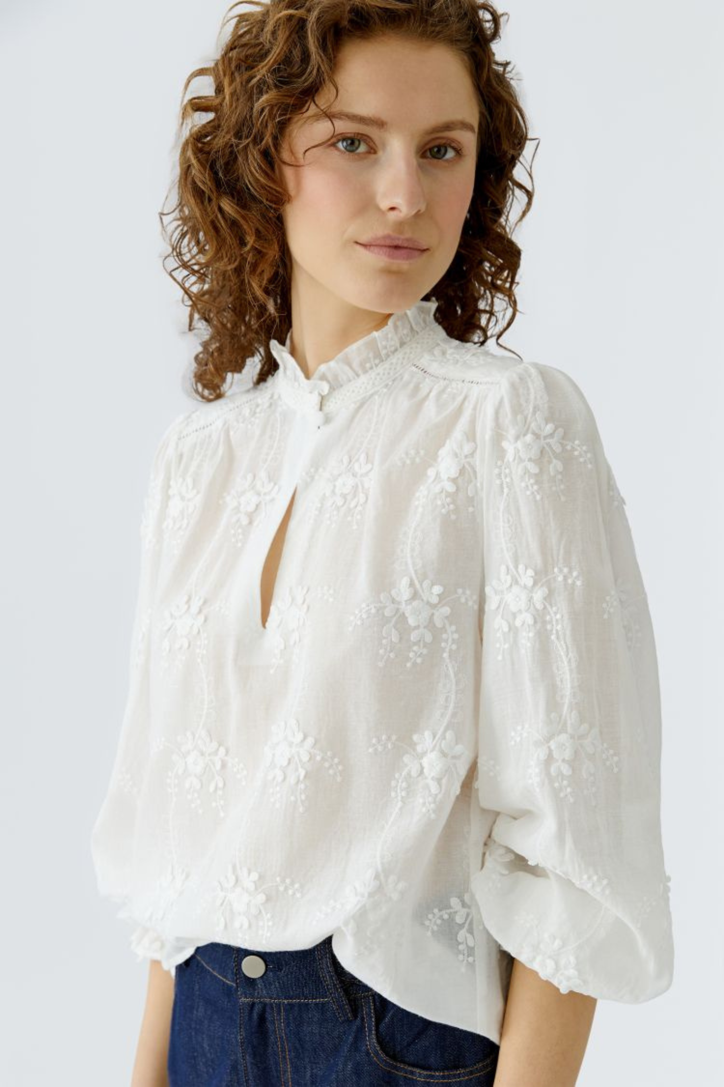 Cotton embroidered blouse by Oui in Cloud Dancer. A soft, feminine style with delicate detail, perfect for everyday and dressed-up looks. Shop at Dotique.