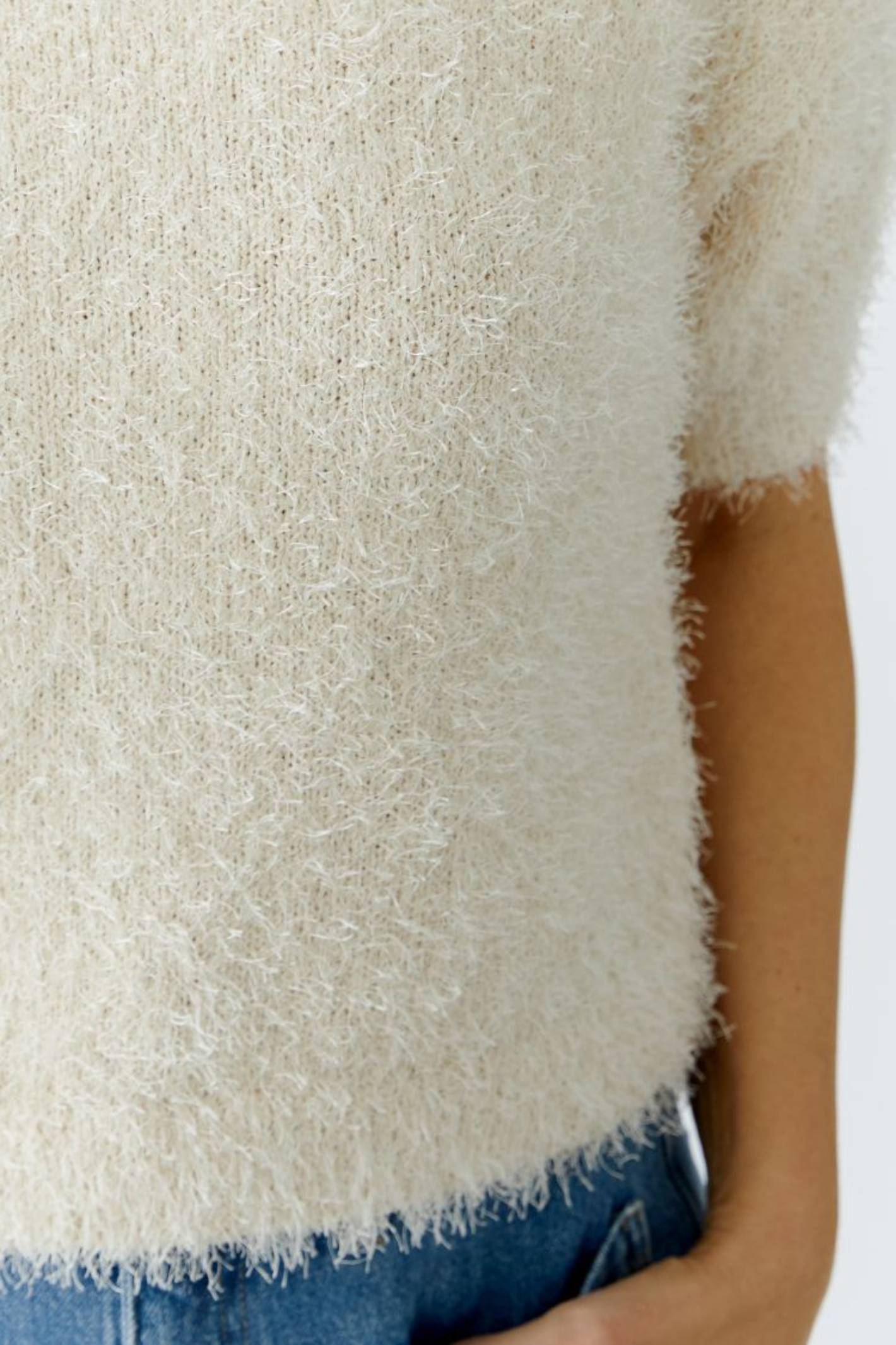 Soft textured short sleeve pullover by Oui in Whitecap Grey. An easy, lightweight knit perfect for layering and everyday wear. Shop at Dotique.