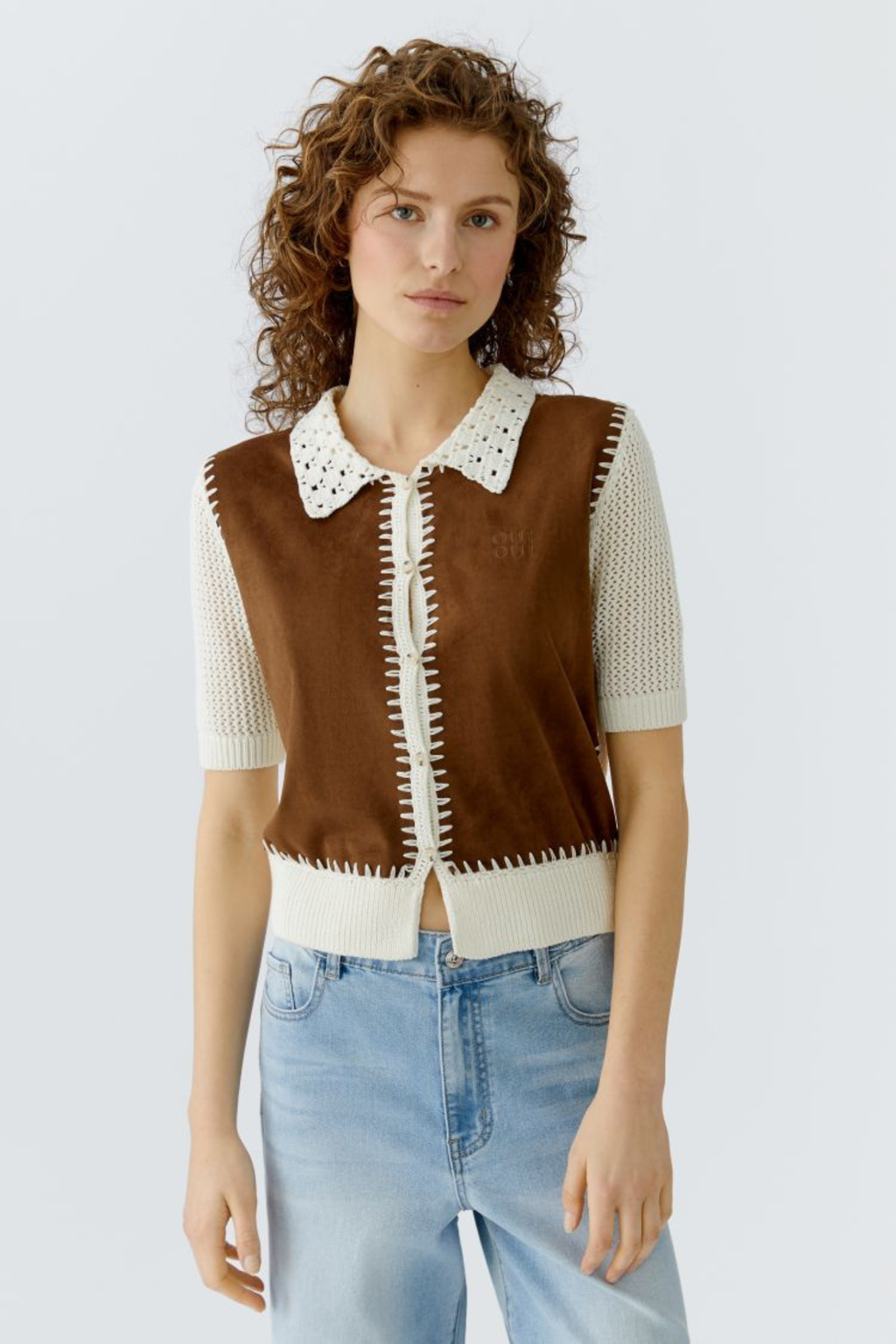 Short-sleeve knit jacket by Oui in White Brown. Lightweight cotton knit with contrast detail and a flattering cropped length. Shop Oui at Dotique.