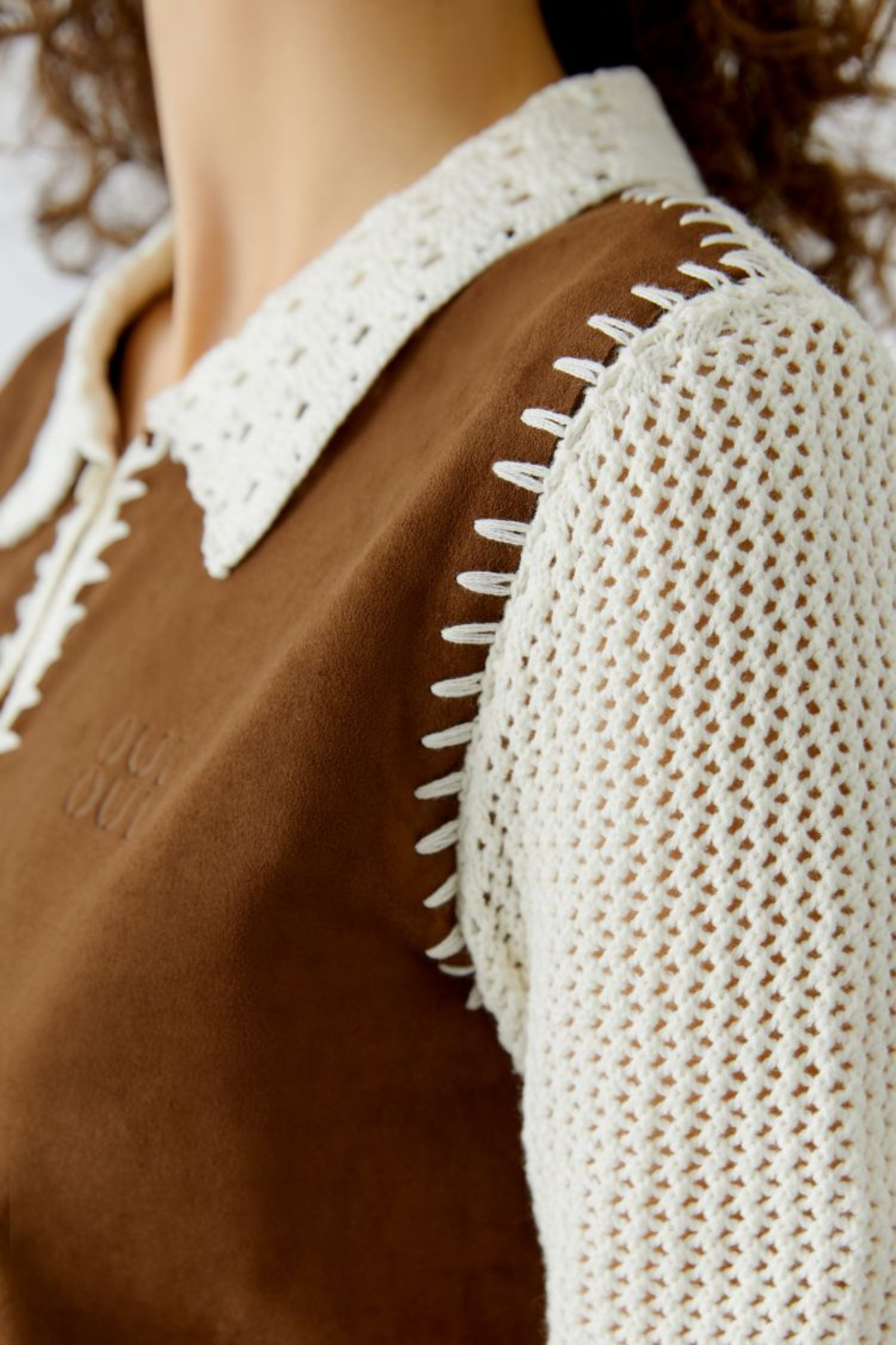Short-sleeve knit jacket by Oui in White Brown. Lightweight cotton knit with contrast detail and a flattering cropped length. Shop Oui at Dotique.