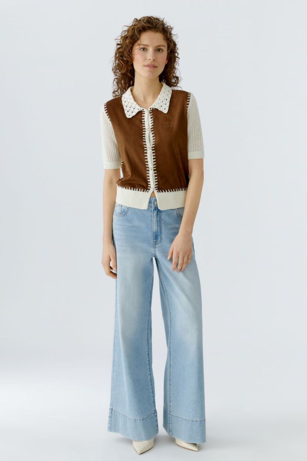 Short-sleeve knit jacket by Oui in White Brown. Lightweight cotton knit with contrast detail and a flattering cropped length. Shop Oui at Dotique.