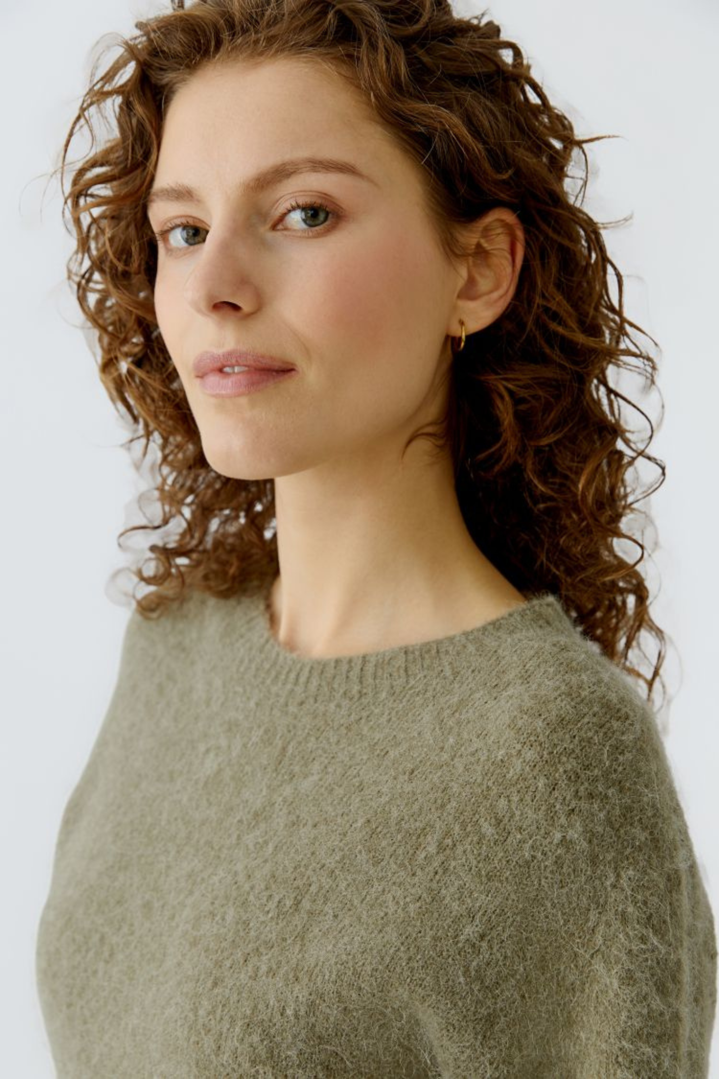 Soft alpaca-blend jumper by Oui in Green Garden. Lightweight, flattering and easy to wear with jeans or tailored trousers. Shop now at Dotique.