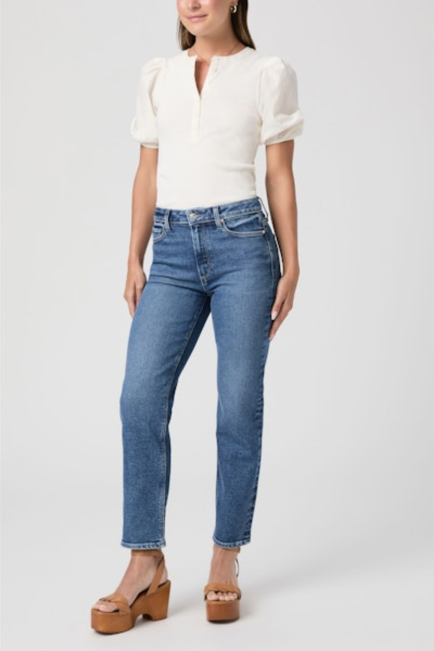 Woman wearing PAIGE Cindy Slim Straight Leg Jeans Saint Martin styled with white top, shop PAIGE at Dotique for modern denim looks