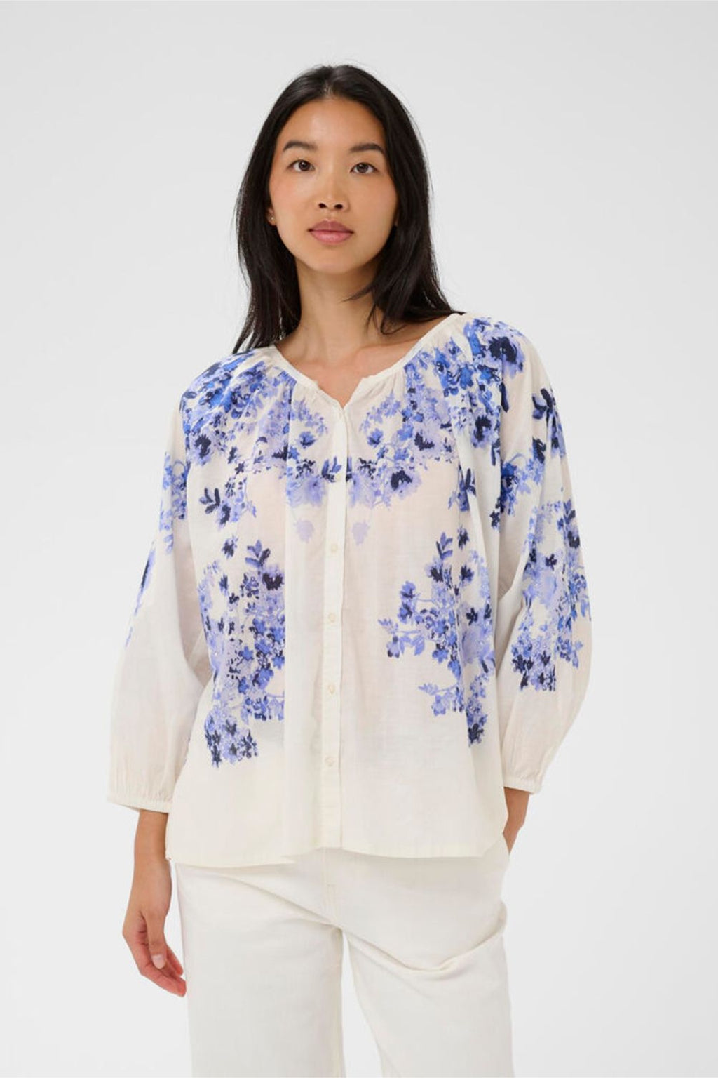 Woman wearing Part Two 30310427 AlexiPW Blue Shadow Flower Print Blouse by Part Two available to shop at Dotique.