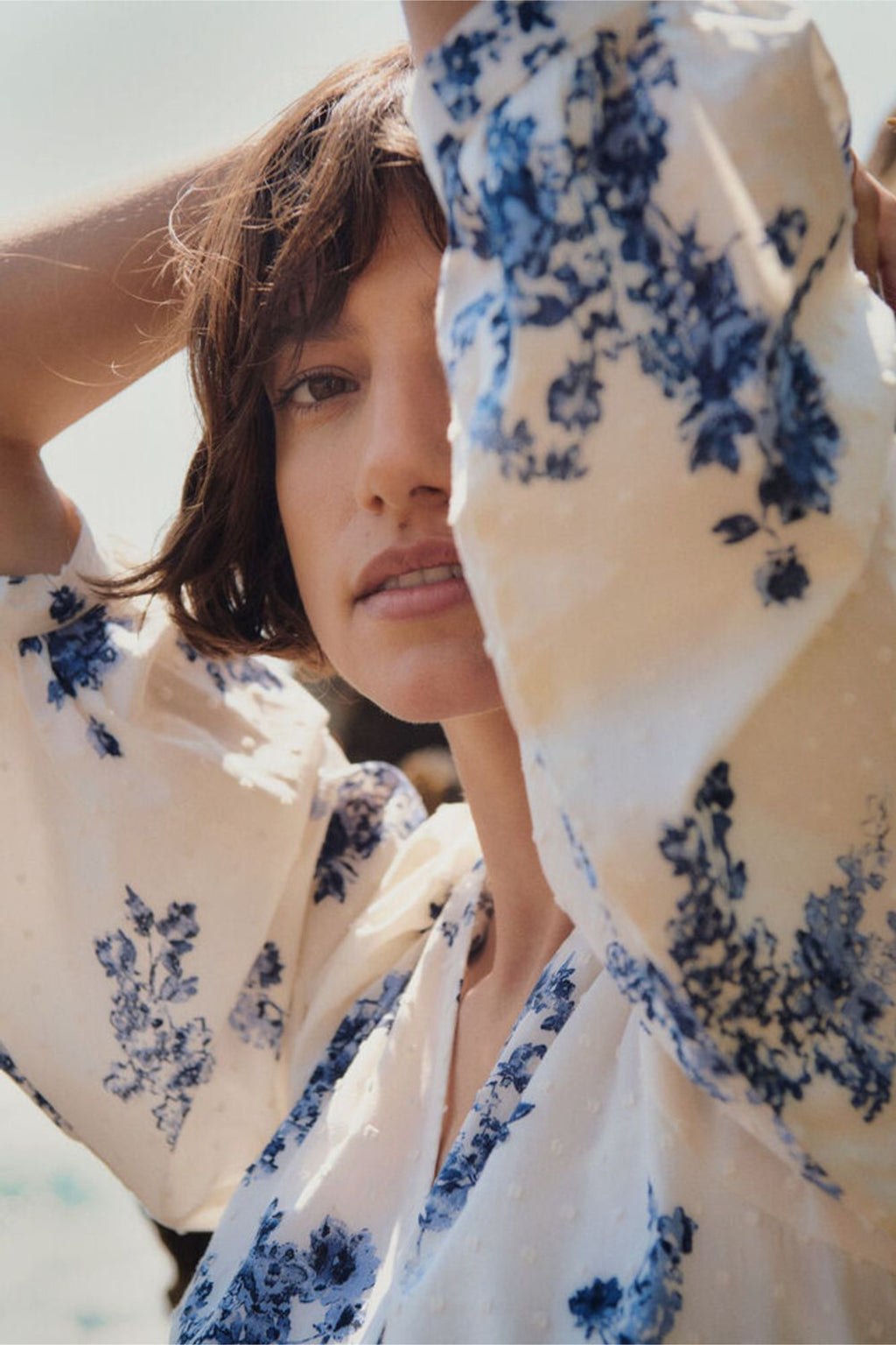 Close-up of a woman wearing Part Two 30310448 AlyaPW Blue Shadow Flower Print Dress by Part Two Shop the brand at Dotique.