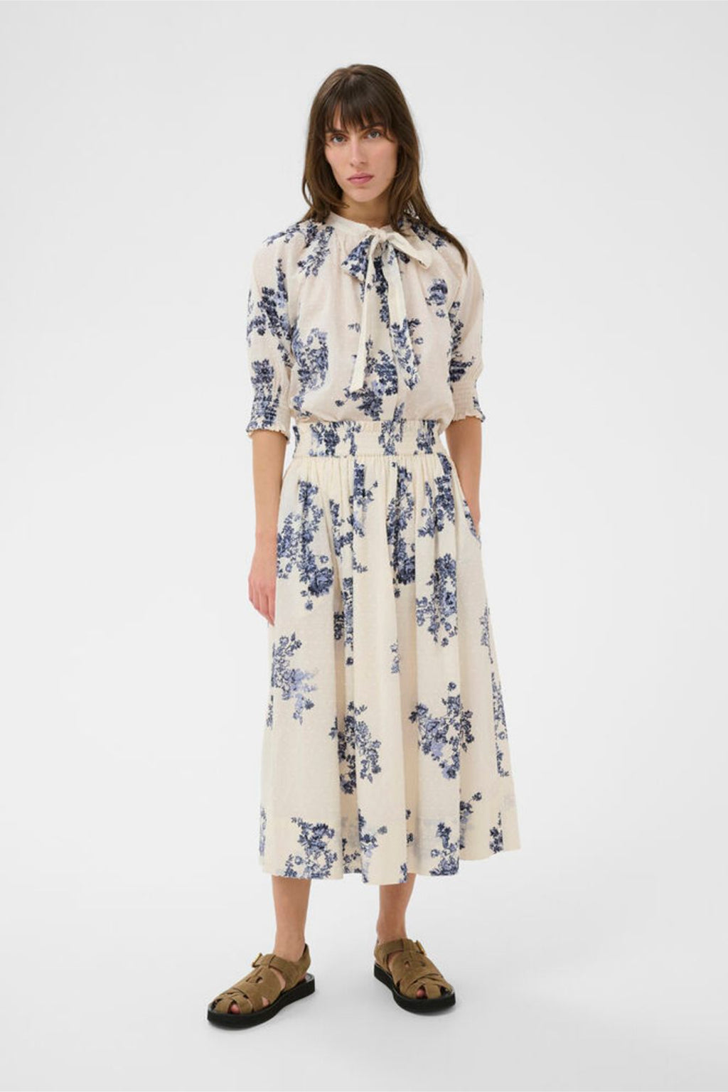 Model wearing Part Two 30310449 AmaiaPW Blue Shadow Flower Print Skirt by Part Two, shop the brand at Dotique.