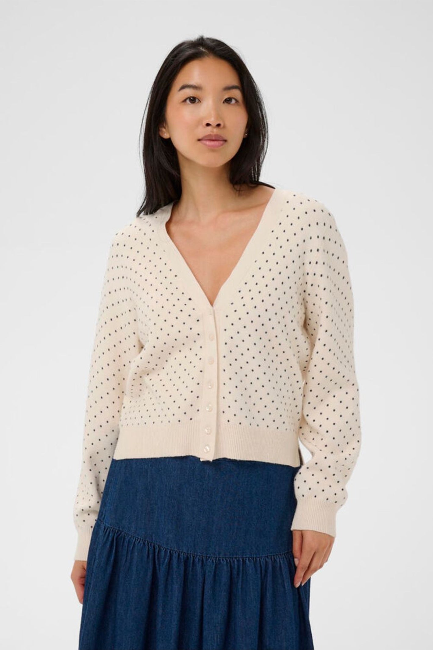 Model wearing Part Two 30310394 AnessaPW Dark Navy Dot Print Cardigan by Part Two, shop the vendor at Dotique.