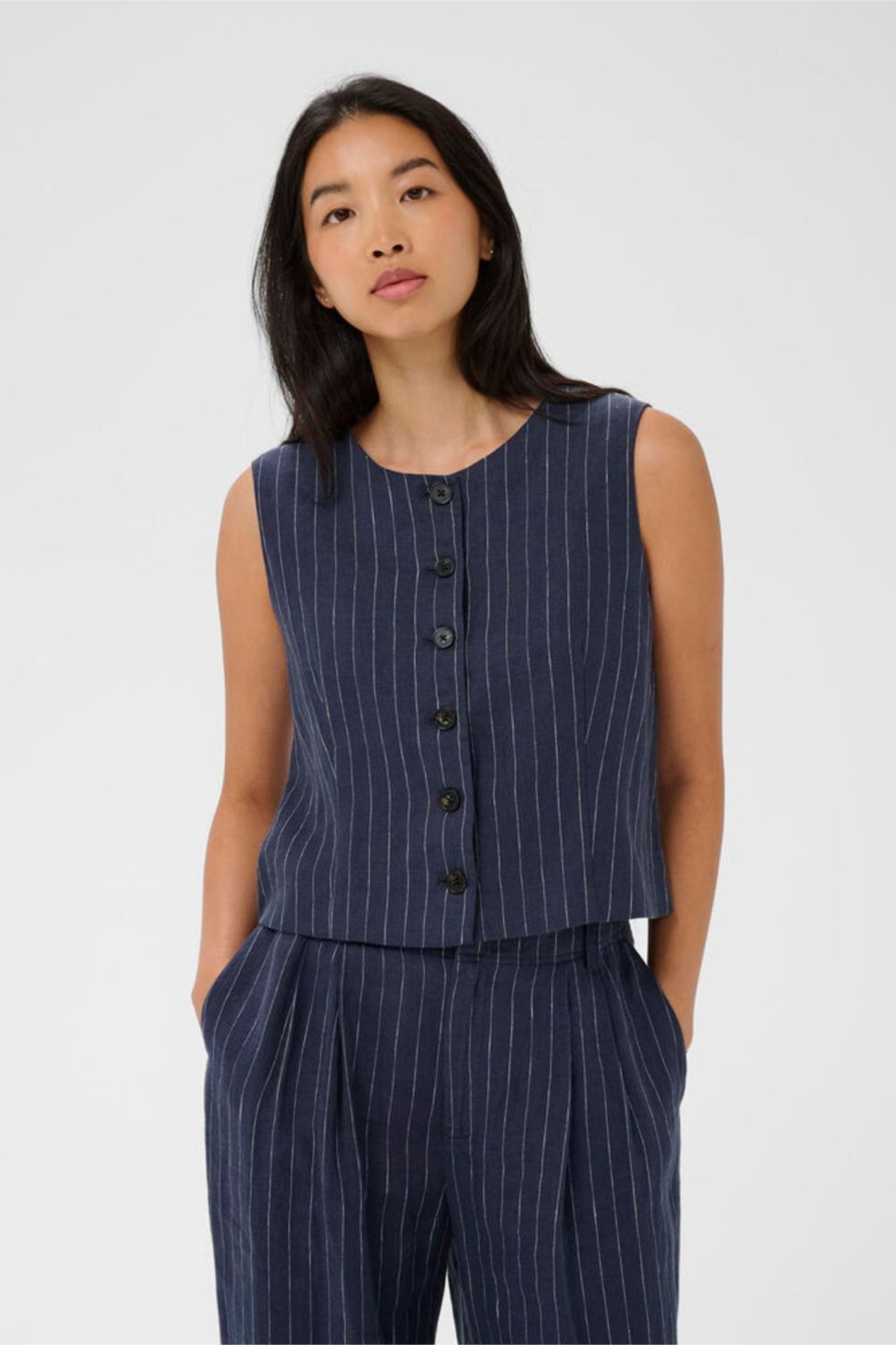 Woman wearing Part Two 30310487 AzaniaPW Blue Nights Pinstripe Waistcoat by Part Two, shop Part Two at Dotique.