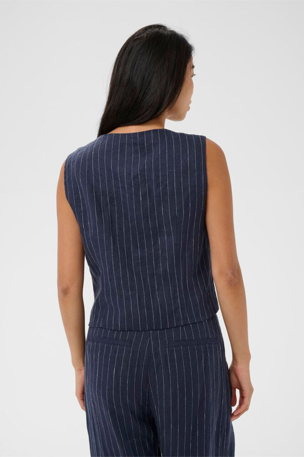 Woman wearing Part Two 30310487 AzaniaPW Blue Nights Pinstripe Waistcoat by Part Two, shop Part Two at Dotique