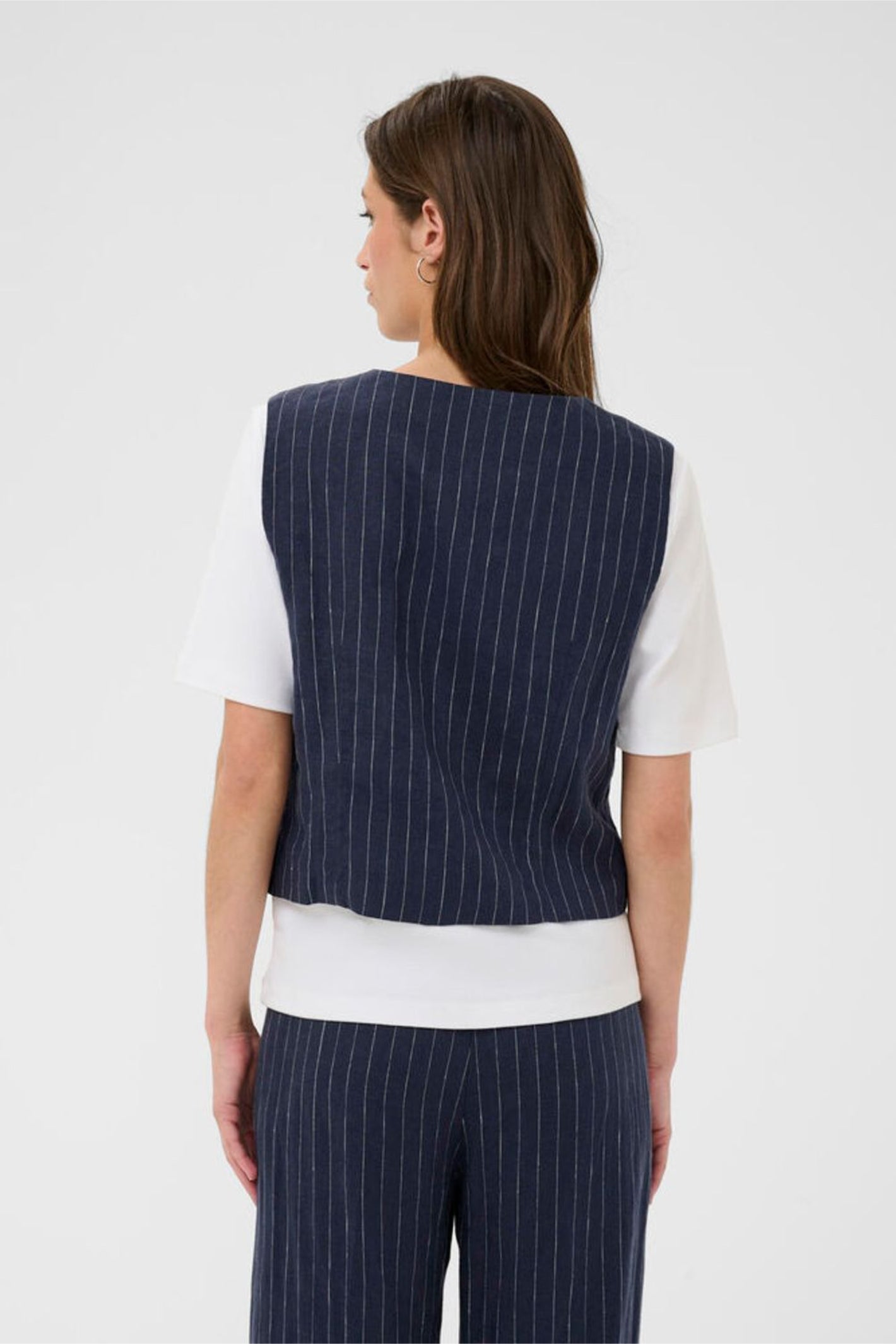 Back view of a woman wearing Part Two 30310487 AzaniaPW Blue Nights Pinstripe Waistcoat by Part Two Shop Part Two at Dotique