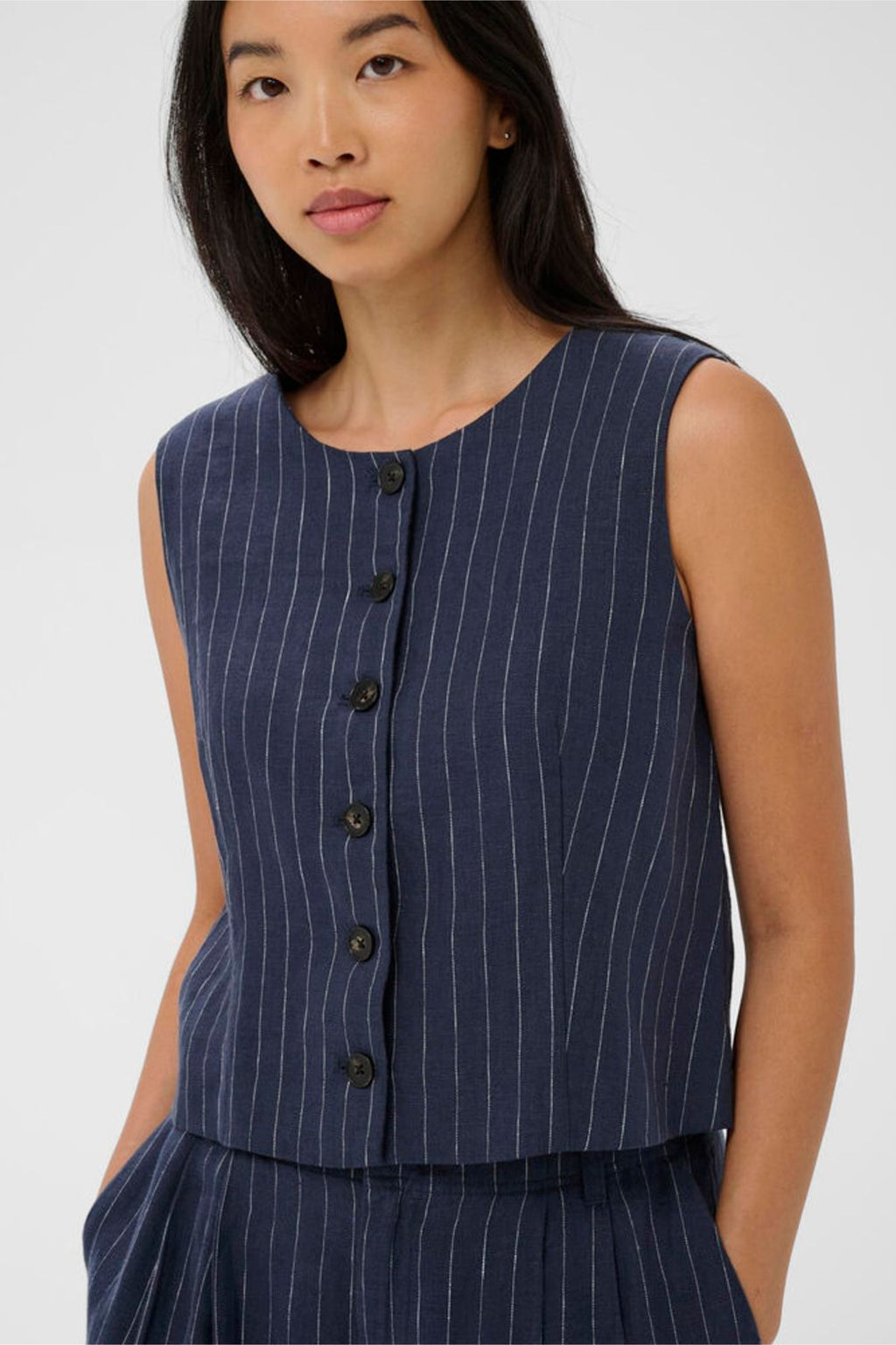 Woman wearing a navy pinstripe waistcoat with buttons, Part Two 30310487 AzaniaPW Blue Nights Pinstripe Waistcoat by Part Two, shop Part Two at Dotique