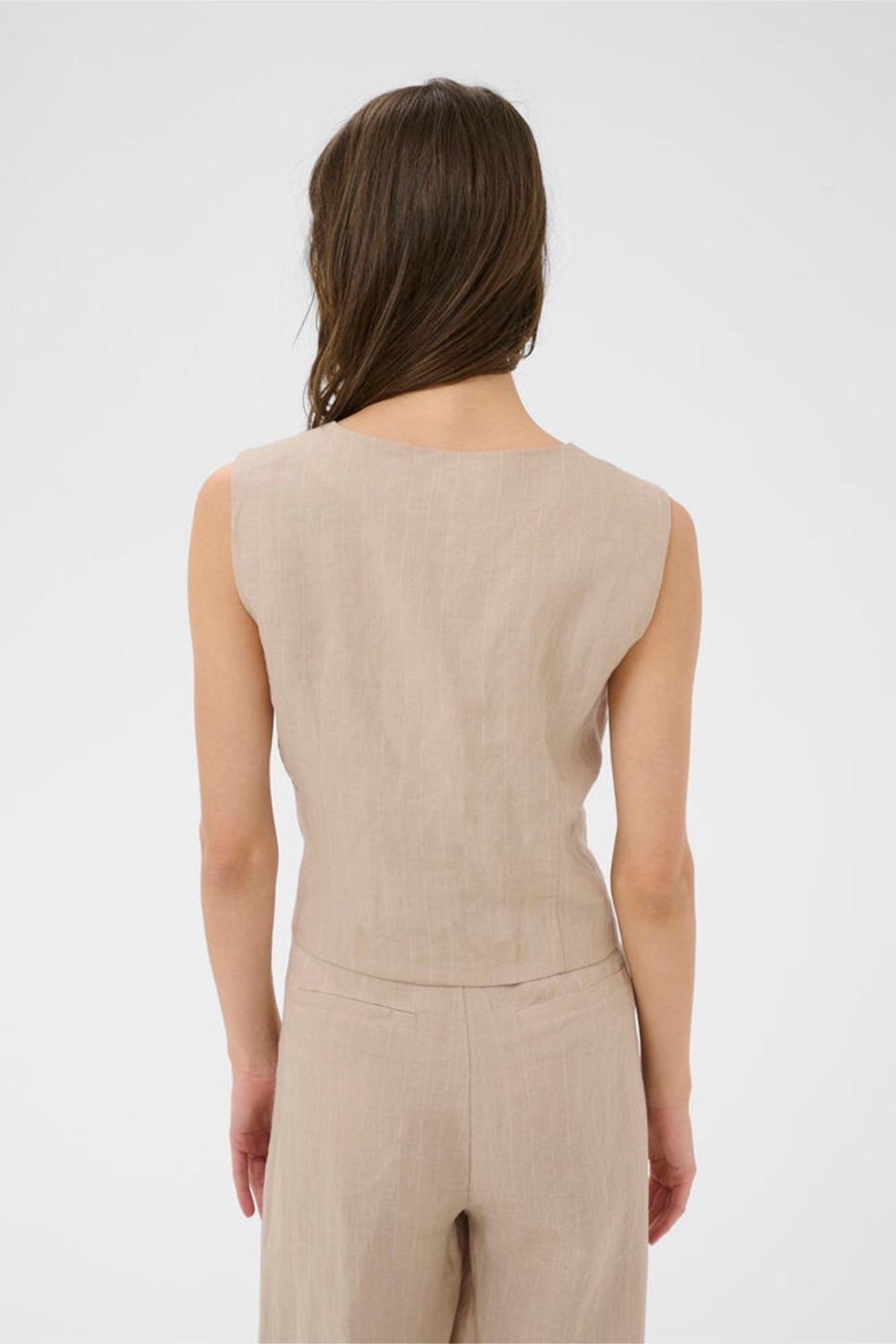 Back view of a sleeveless neutral waistcoat with pinstripe design by Part Two Shop Part Two 30310487 AzaniaPW Neutral Pinstripe Waistcoat at Dotique