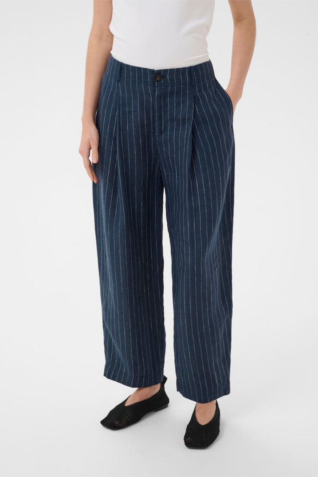Model wearing Part Two 30310444 NettasPW Blue Nights Pinstripe Trousers by Part Two, shop the vendor at Dotique.