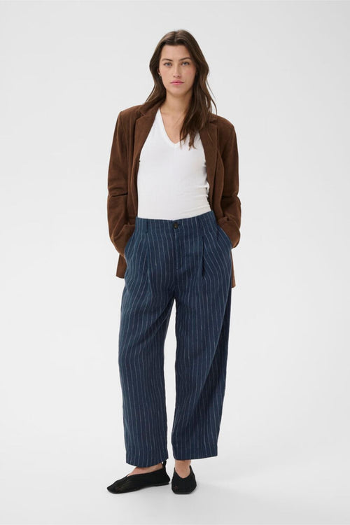 Part Two 30310444 NettasPW Blue Nights Pinstripe Trousers by Part Two modeled with a brown blazer and white top Shop Part Two at Dotique
