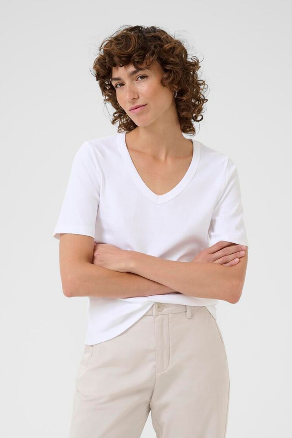 White V-neck T-shirt by Part Two made from 100% organic cotton. A timeless wardrobe staple that’s easy to style with jeans or tailoring. Dotique.