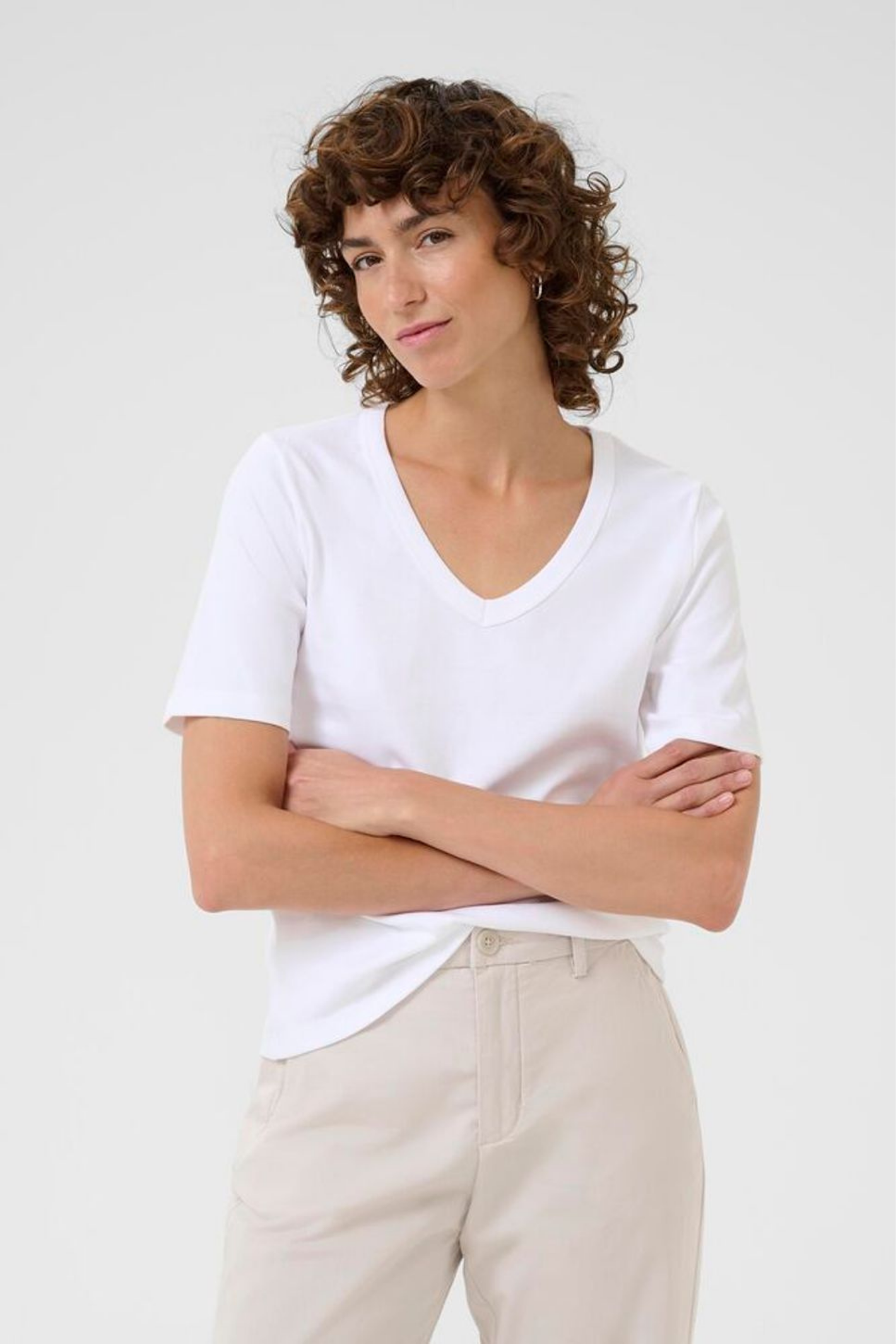White V-neck T-shirt by Part Two made from 100% organic cotton. A timeless wardrobe staple that’s easy to style with jeans or tailoring. Dotique.