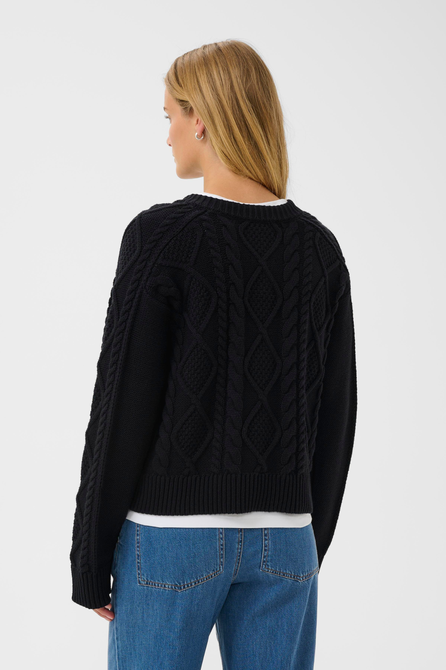 Dark navy cable knit cardigan by Part Two with button front. Soft, easy to wear and perfect for everyday layering.