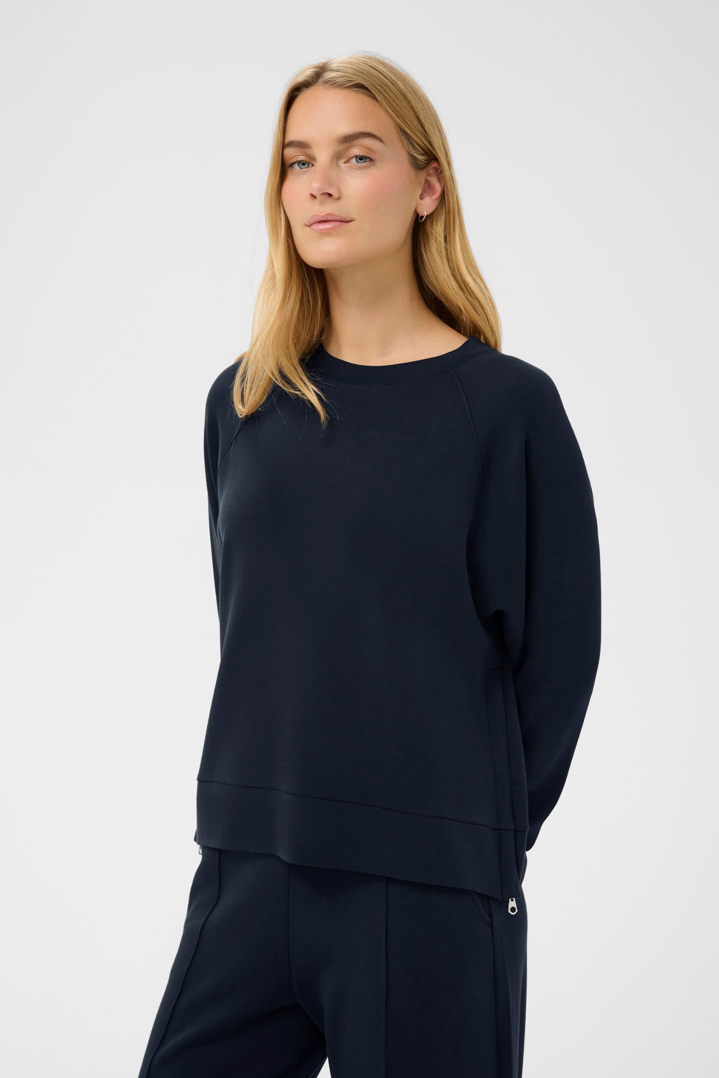Dark navy sweatshirt by Part Two with side zip details. Soft, relaxed and easy to wear for everyday comfort.
