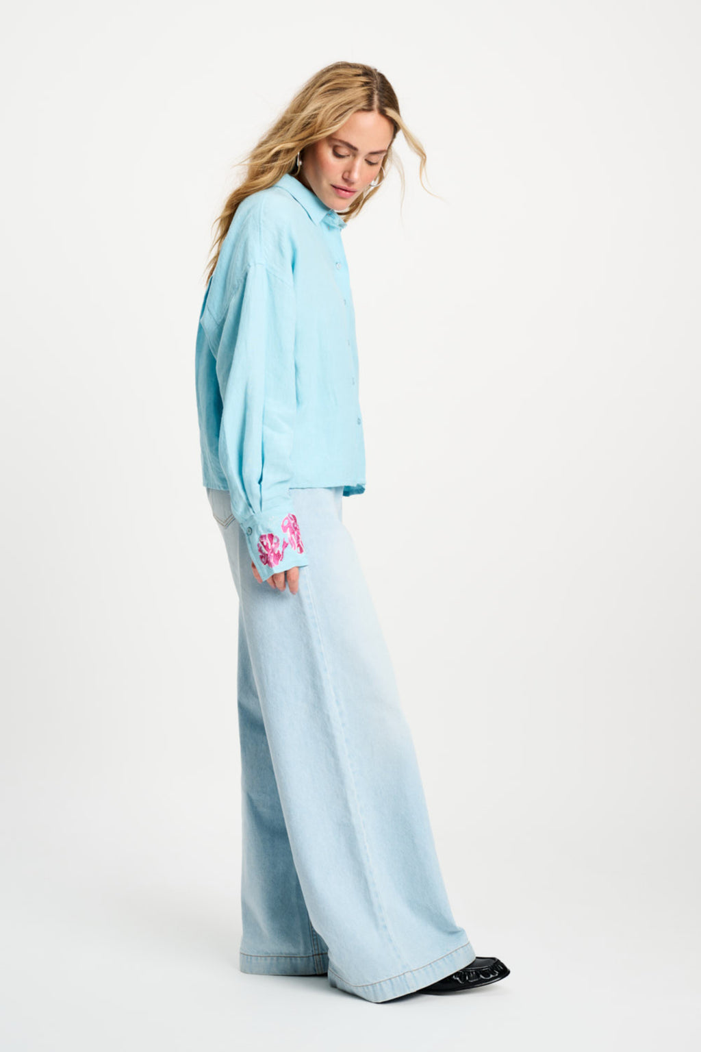 Side view of woman wearing Pom Amsterdam SP9499 Amsterdam Blue Sequins Urban Flora Blouse by Pom Amsterdam shop Dotique