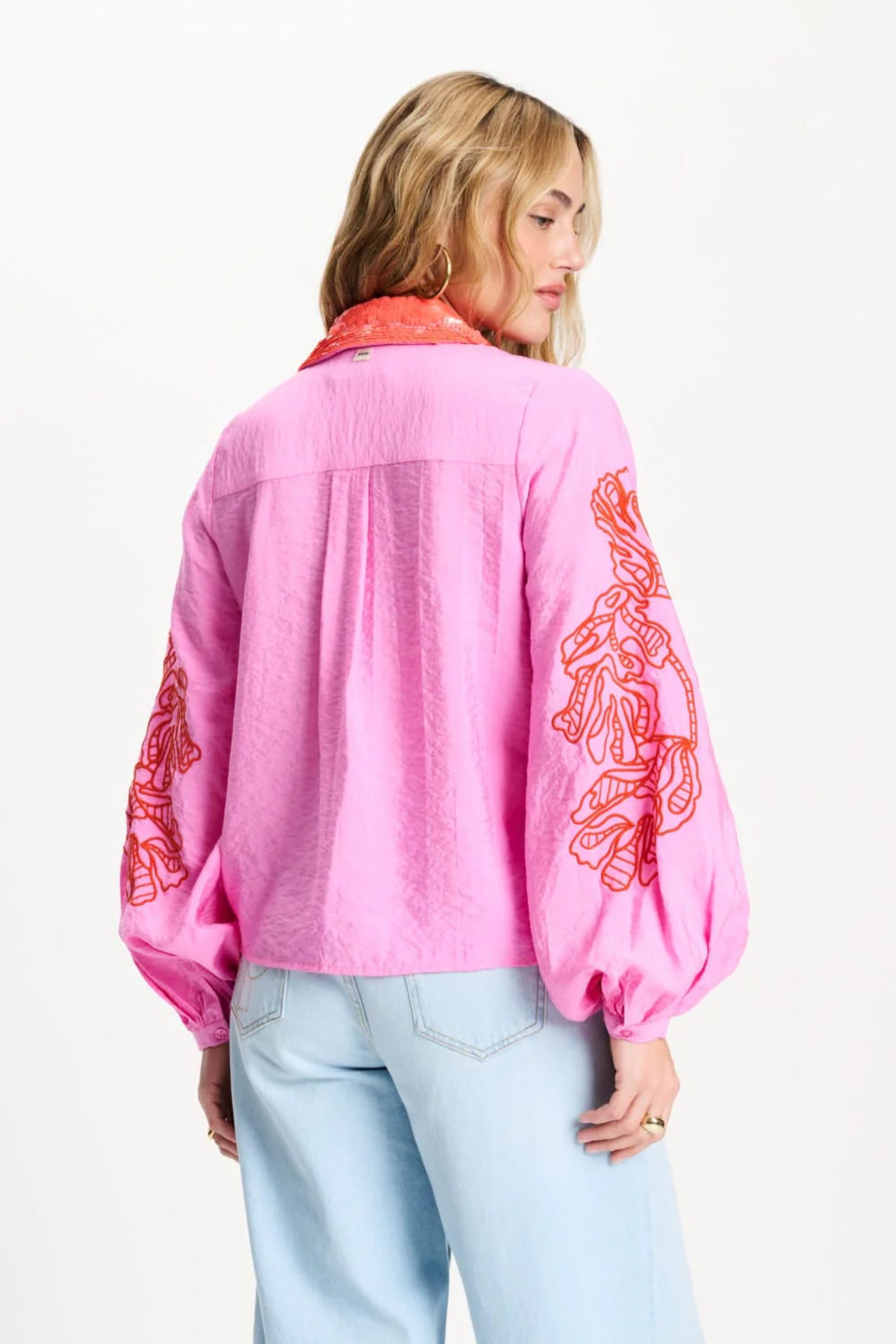 Back view of woman wearing Pom Amsterdam SP9506 Cheering Pink Sequins Blouse by Pom Amsterdam shop Dotique for stylish looks