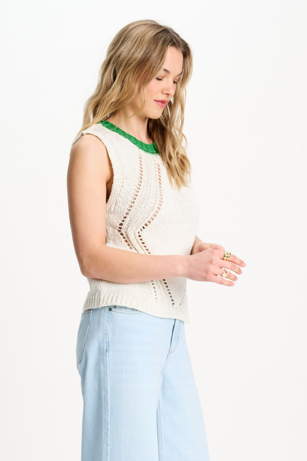Side view of model wearing Pom Amsterdam SP9570 Spencer Colourblock White Organic Cotton Knit Top by Pom Amsterdam shop Dotique