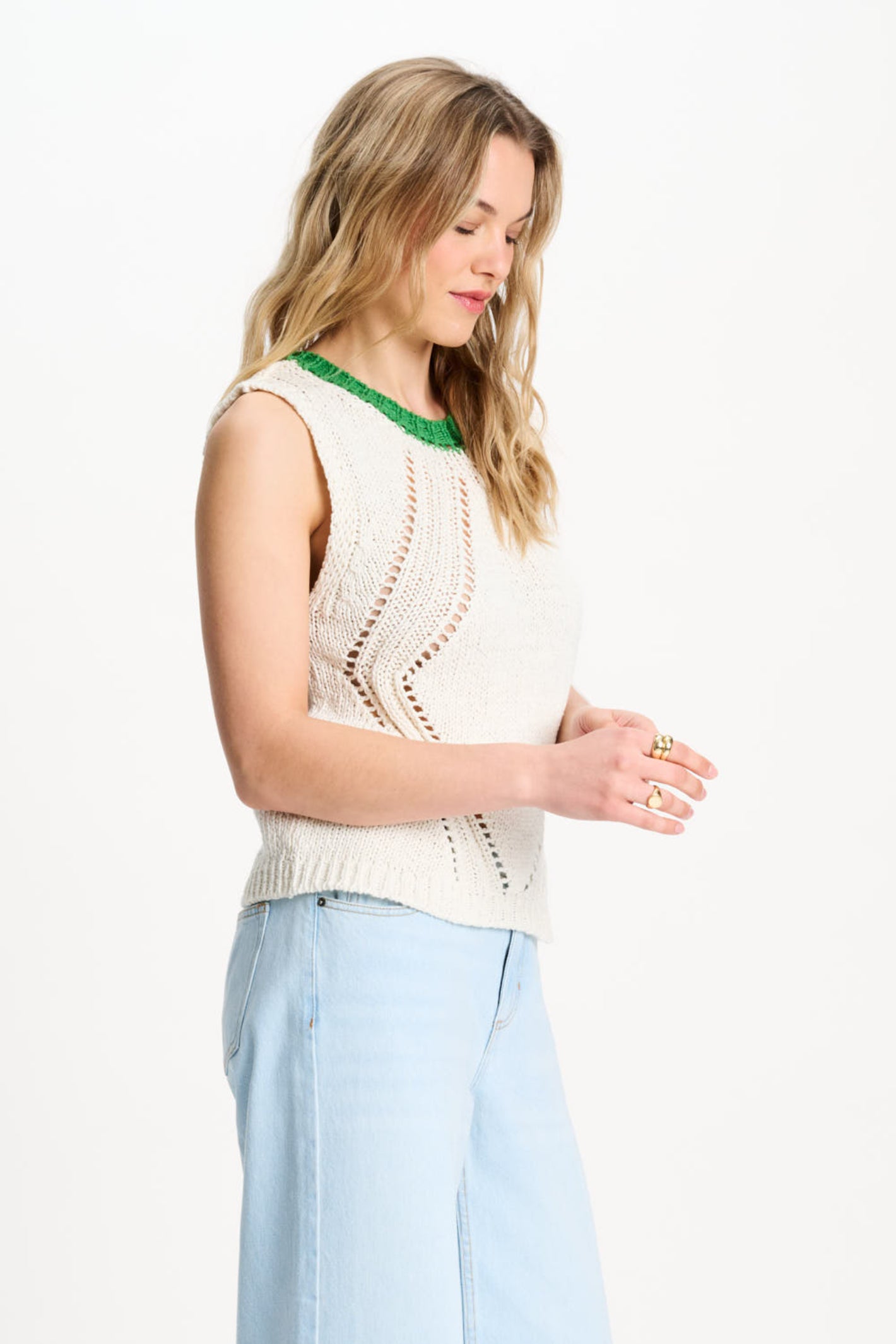Side view of model wearing Pom Amsterdam SP9570 Spencer Colourblock White Organic Cotton Knit Top by Pom Amsterdam shop Dotique