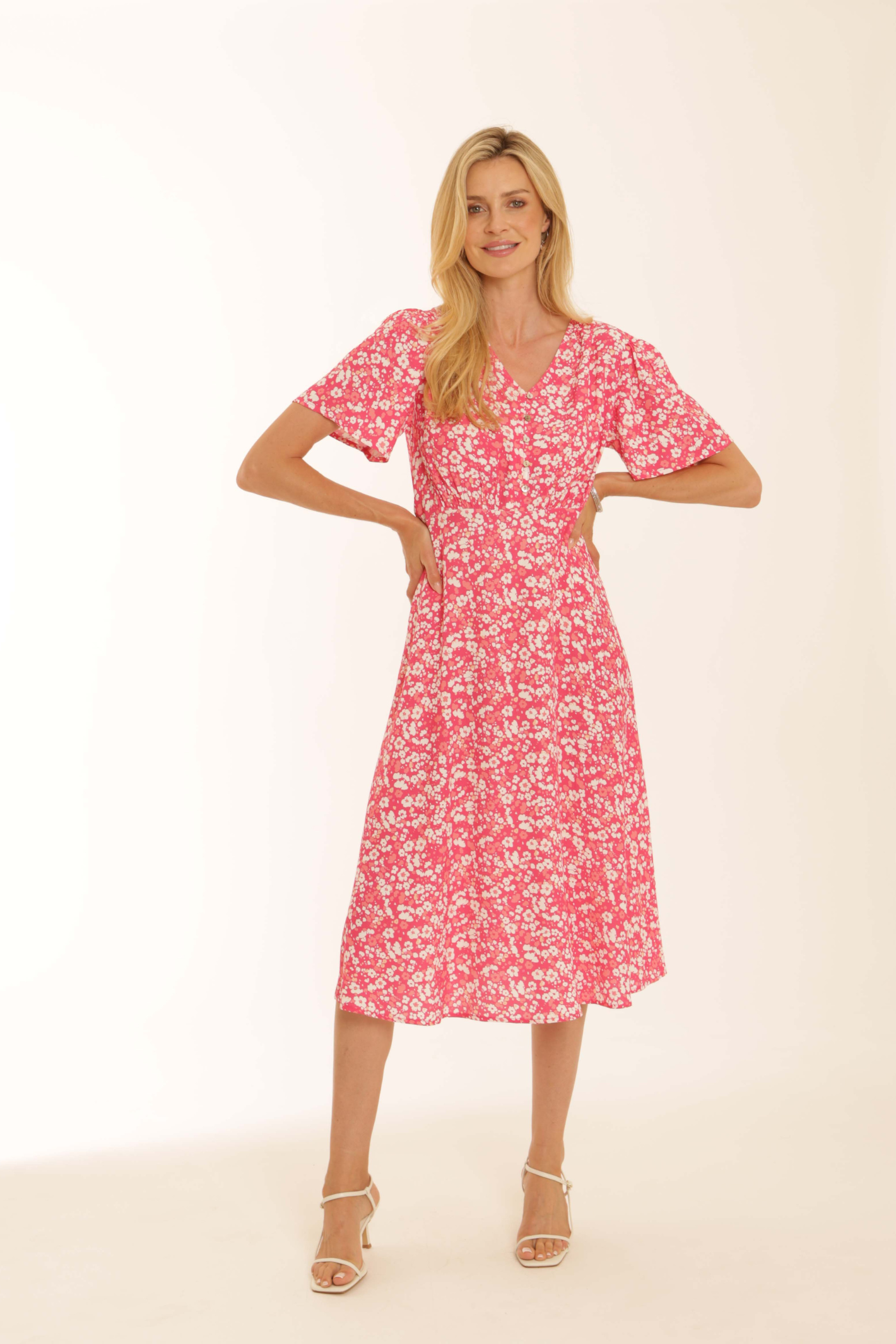 Model wearing Pomodoro 52603 Ditsy Tea Dress Pink by pomodoro, shop pomodoro styles at Dotique with floral print design