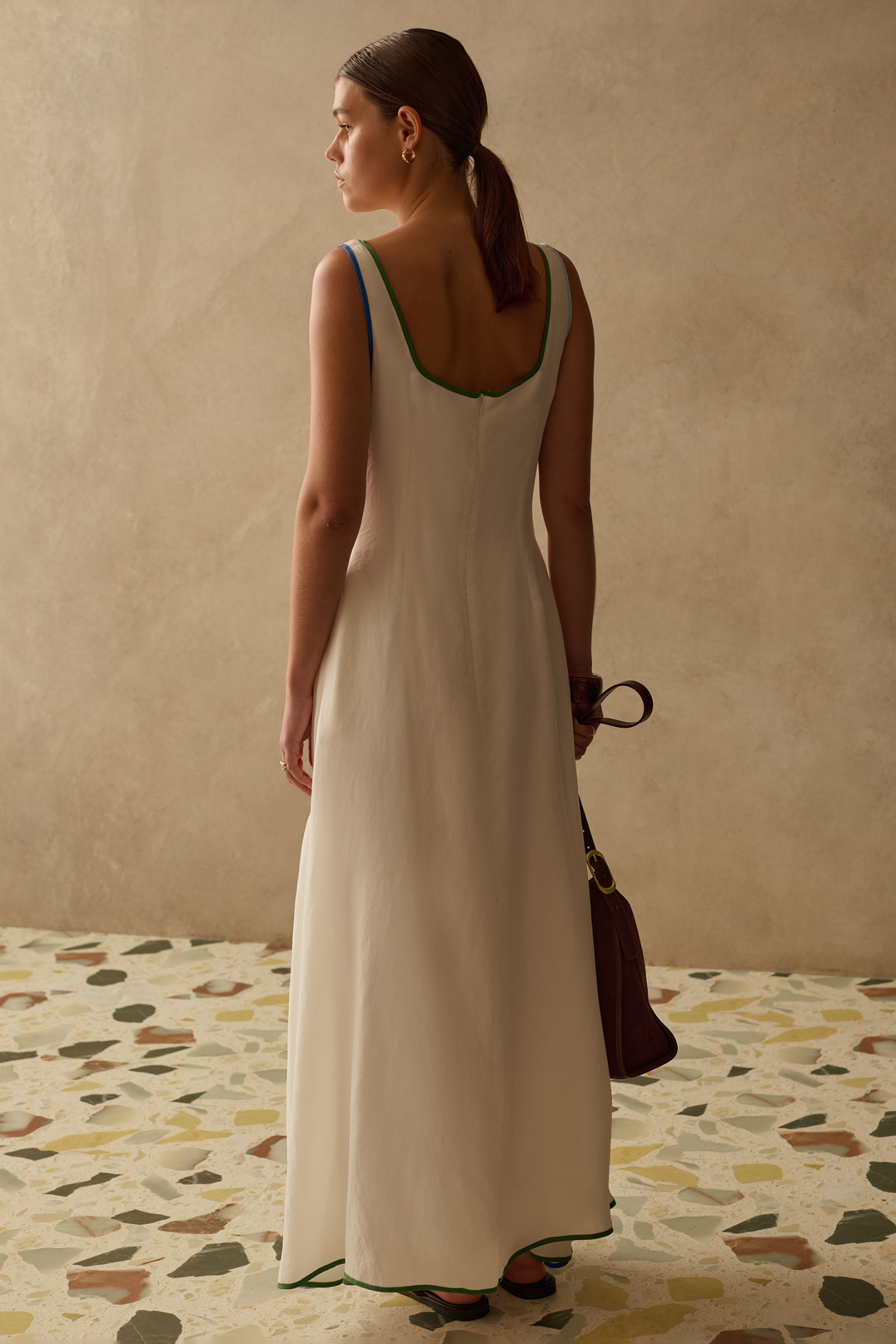 Relaxed yet flattering maxi dress by Sancia with a square neckline and adjustable tie front. Lightweight, easy to wear and perfect for summer. Shop at Dotique.
