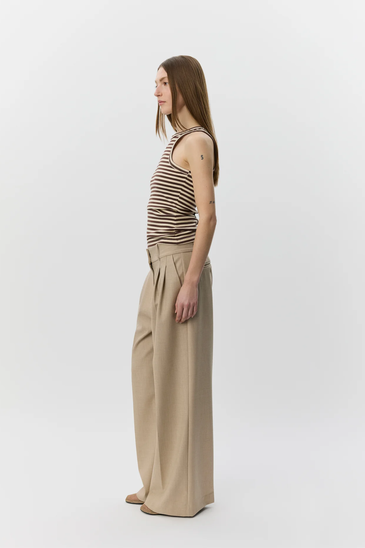 Model wearing Sofie Schnoor Becasw Striped Rib Tank Top S262360 by Sofie Schnoor, shop Sofie Schnoor at Dotique