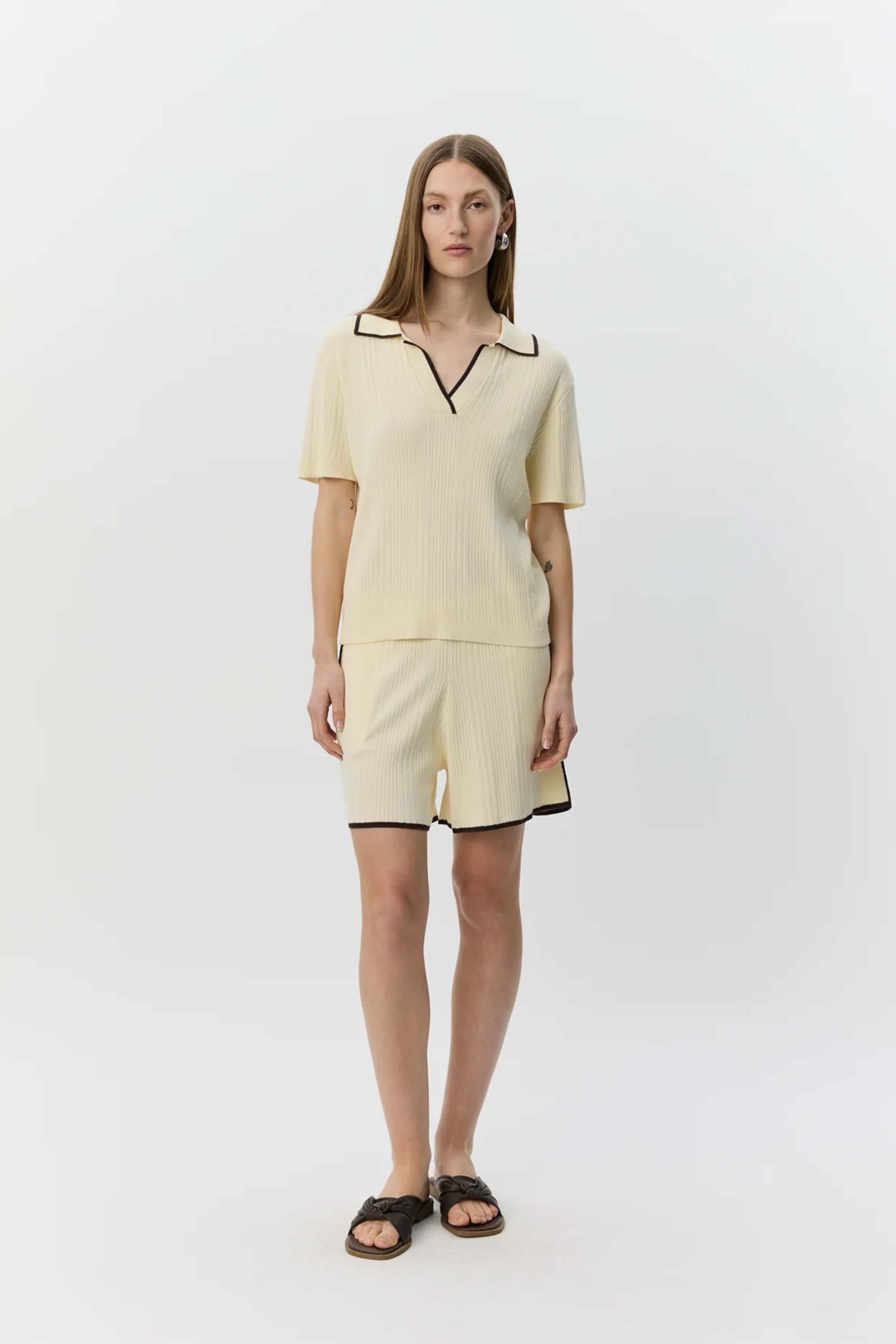 Model wearing Sofie Schnoor Jamiesw Knit Polo S262341 by Sofie Schnoor, shop Sofie Schnoor at Dotique.