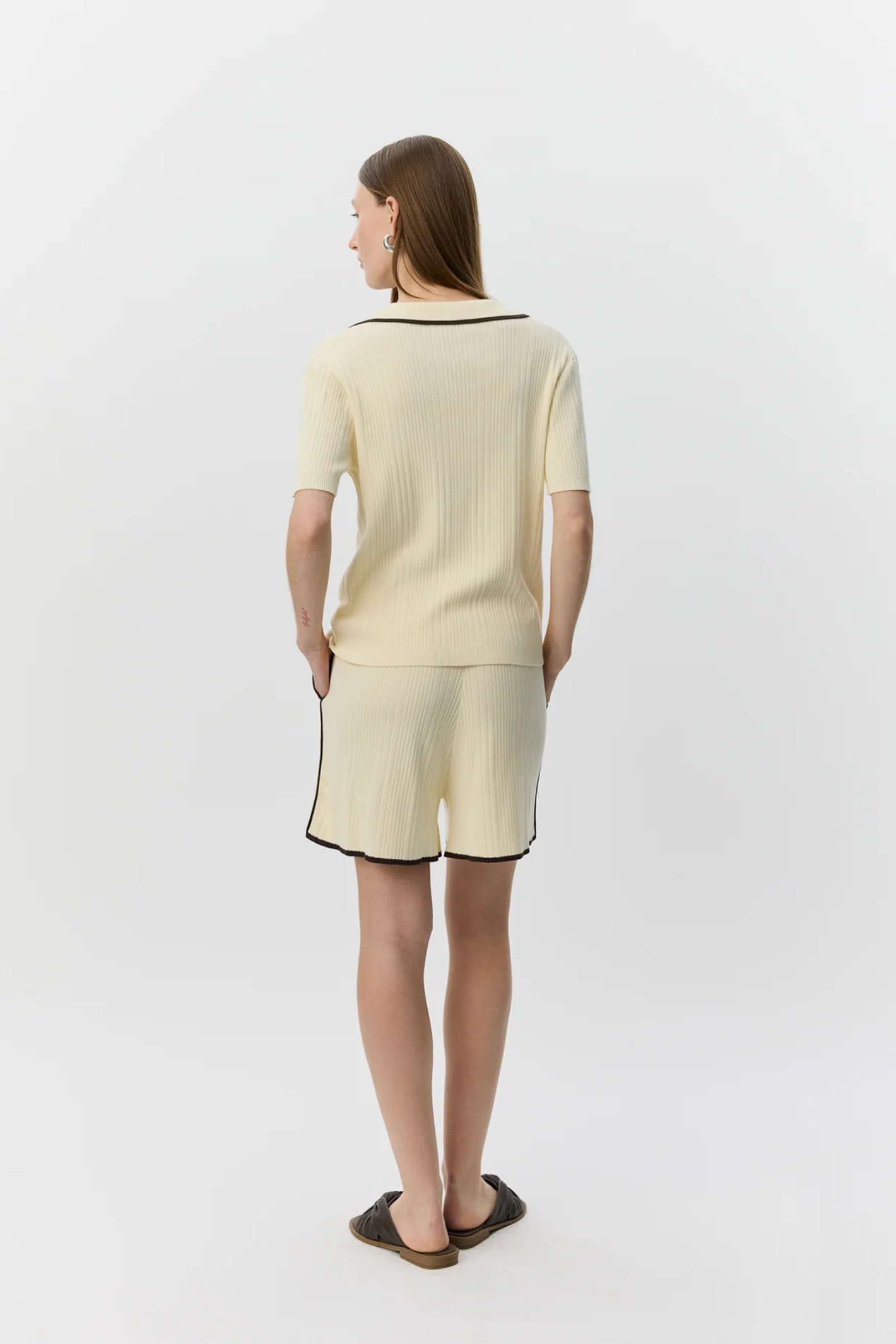 Back view of model wearing Sofie Schnoor Jamiesw Knit Polo S262341 cream knit set by Sofie Schnoor Shop at Dotique