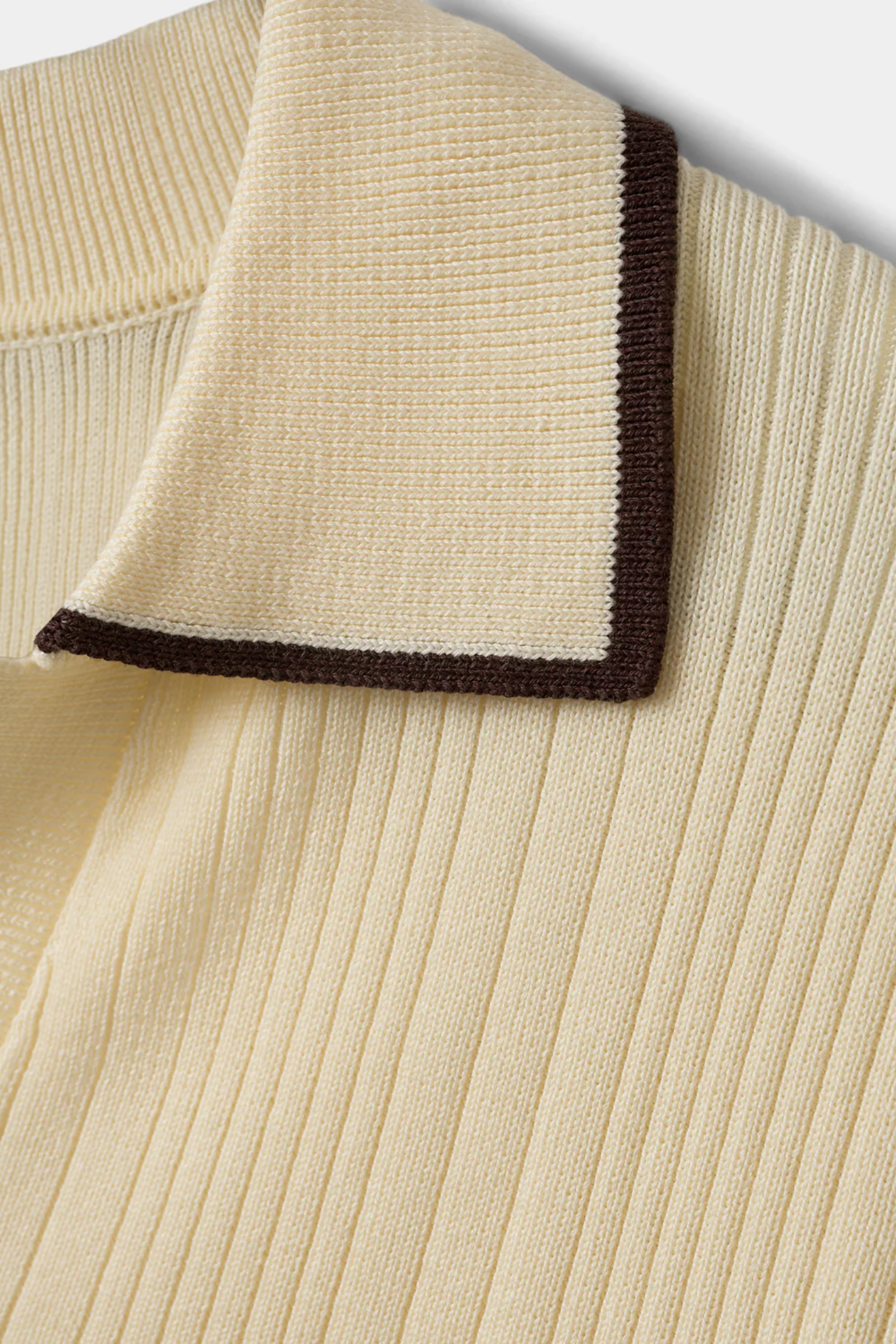 Sofie Schnoor Jamiesw Knit Polo S262341 by Sofie Schnoor featuring a ribbed cream knit with dark edge collar, shop Sofie Schnoor at Dotique