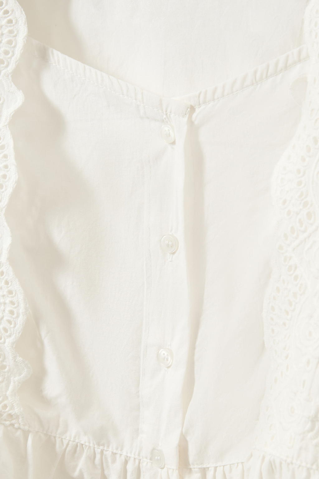 The Sofie Schnoor S261185 Ariasw Broderie Anglaise Shirt is a beautifully feminine piece with timeless appeal. Shop Sofie Schnoor at Dotique.