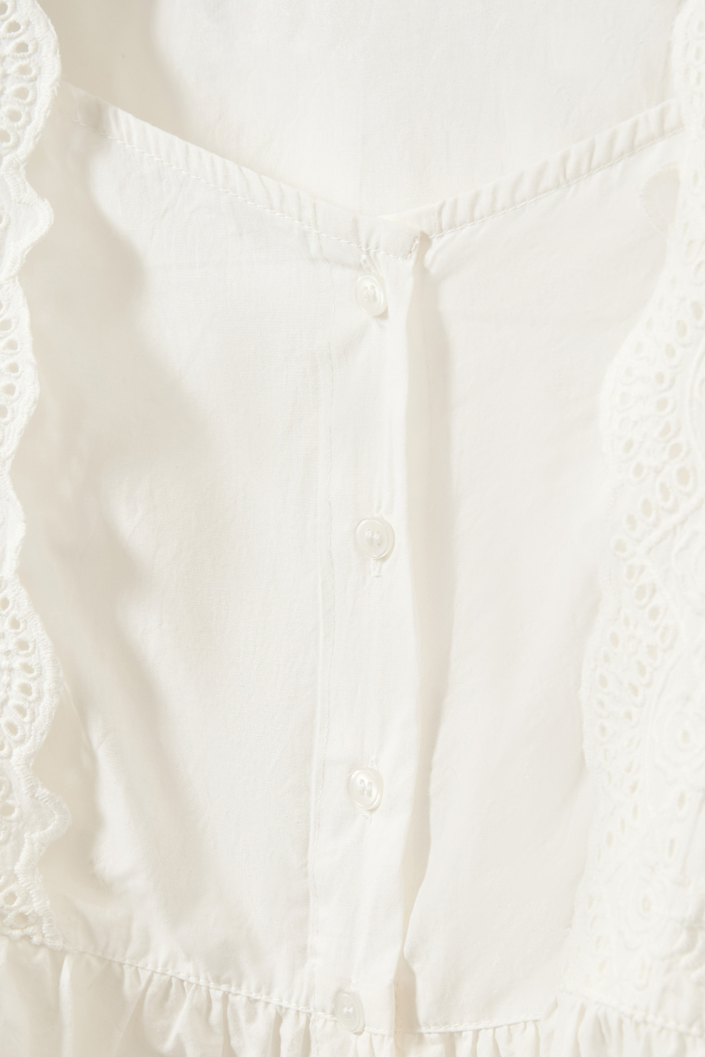 The Sofie Schnoor S261185 Ariasw Broderie Anglaise Shirt is a beautifully feminine piece with timeless appeal. Shop Sofie Schnoor at Dotique.