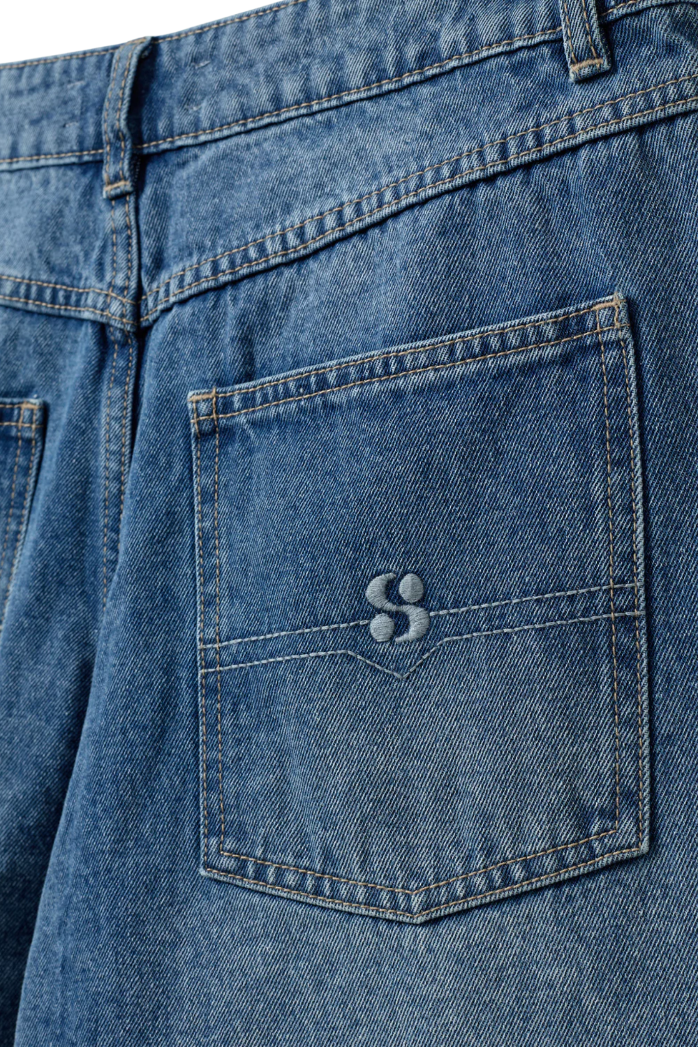 Close-up of back pocket detail on Sofie Schnoor SNOS727 Stokesw Shorts – Denim Blue by Sofie Schnoor, shop at Dotique